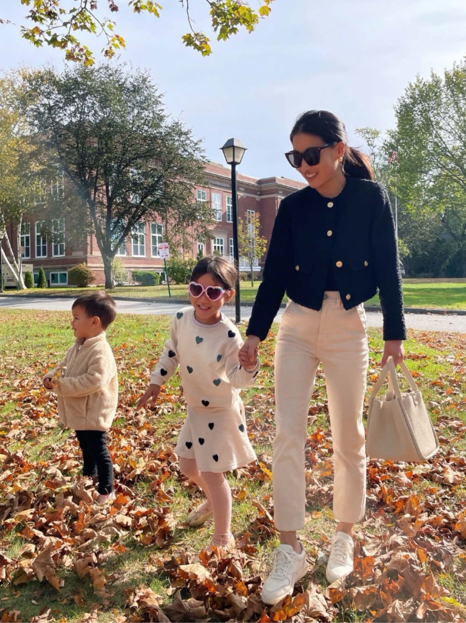 Nori’s sweater skirt set is back in stock! She asked for the pink hearts this time.

Also Linked a bunch of boys & girls items I bought for back to school during their kids sale right now. 

On me:
• Abercrombie jacket xxs - I fold the sleeves under 

• Everlane jeans - few sizes left , so I also linked a similar J. Crew pair which are on sale and fit really well for petites!

• Everlane sneakers 5

• YSL sunglasses

• Songmont bag 

On Nori:  
• H&M girl’s sweater / skirt set - restocked in several adorable patterns! She’s wearing 4/6 here and I took the elastic skirt waist in 

On Rio: Uniqlo fleece - we love these!

#LTKSeasonal #LTKkids #LTKfamily