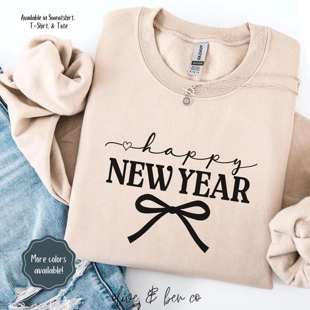 Happy New Year Sweatshirt: Bow Coquette Style, New Year's Eve Shirt, Festive Party Outfit, Etsy sweatshirt 

#LTKSeasonal #LTKFindsUnder50 #LTKSeasonal #LTKGiftGuide #LTKHoliday