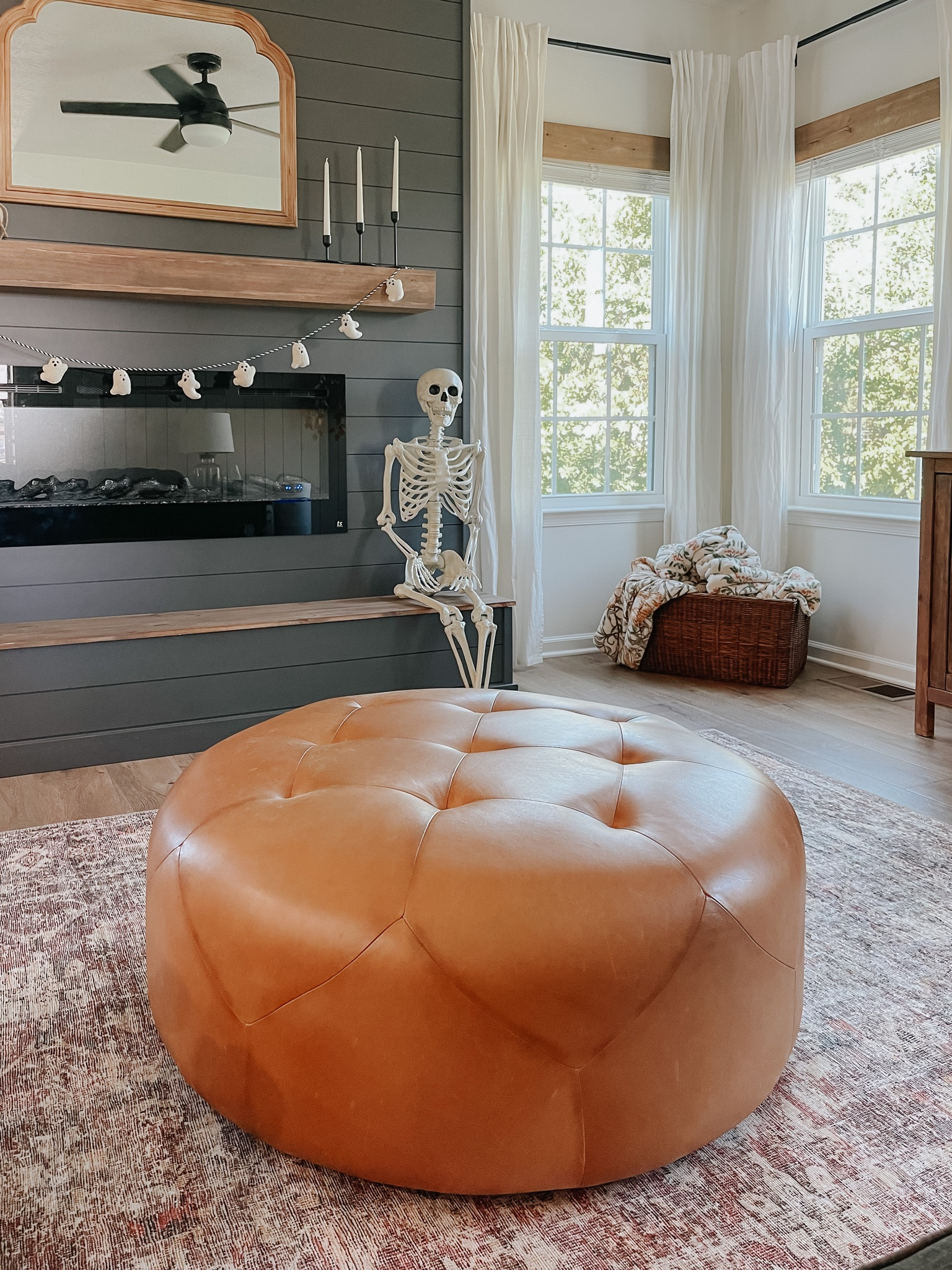 Loving this cool fall weather! Our skeleton has been staying warm by the fire! This new studio McGhee basket is one of my new favorite target finds. It’s huge and hold all my favorite $15 Target throw blankets. #falldecor #throwblanket #livingroomrug #halloweendecor #studiomcghee 

#LTKhome #LTKHoliday #LTKSeasonal