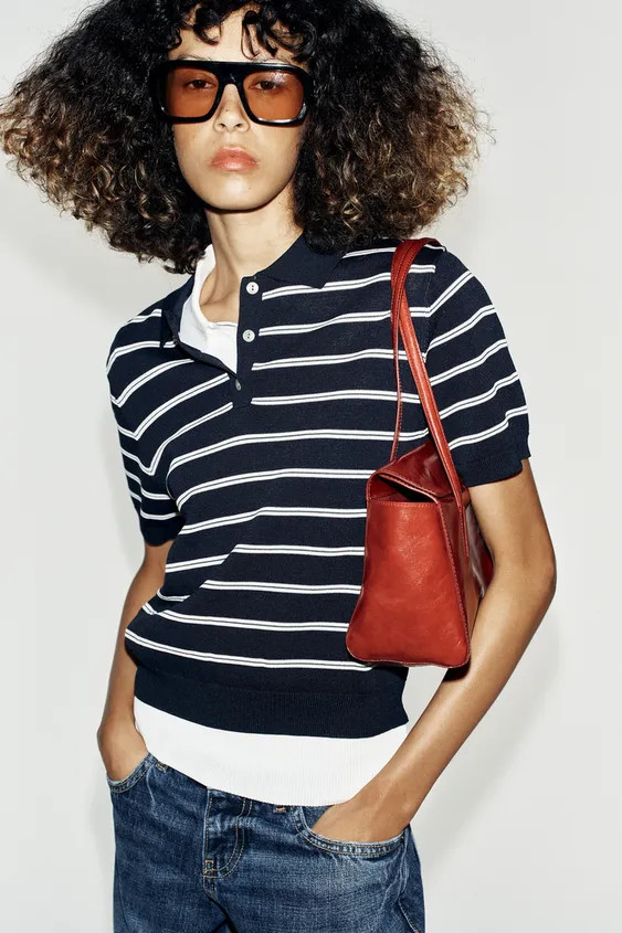 Short sleeve top with a polo collar and front buttons. | Zara IT
