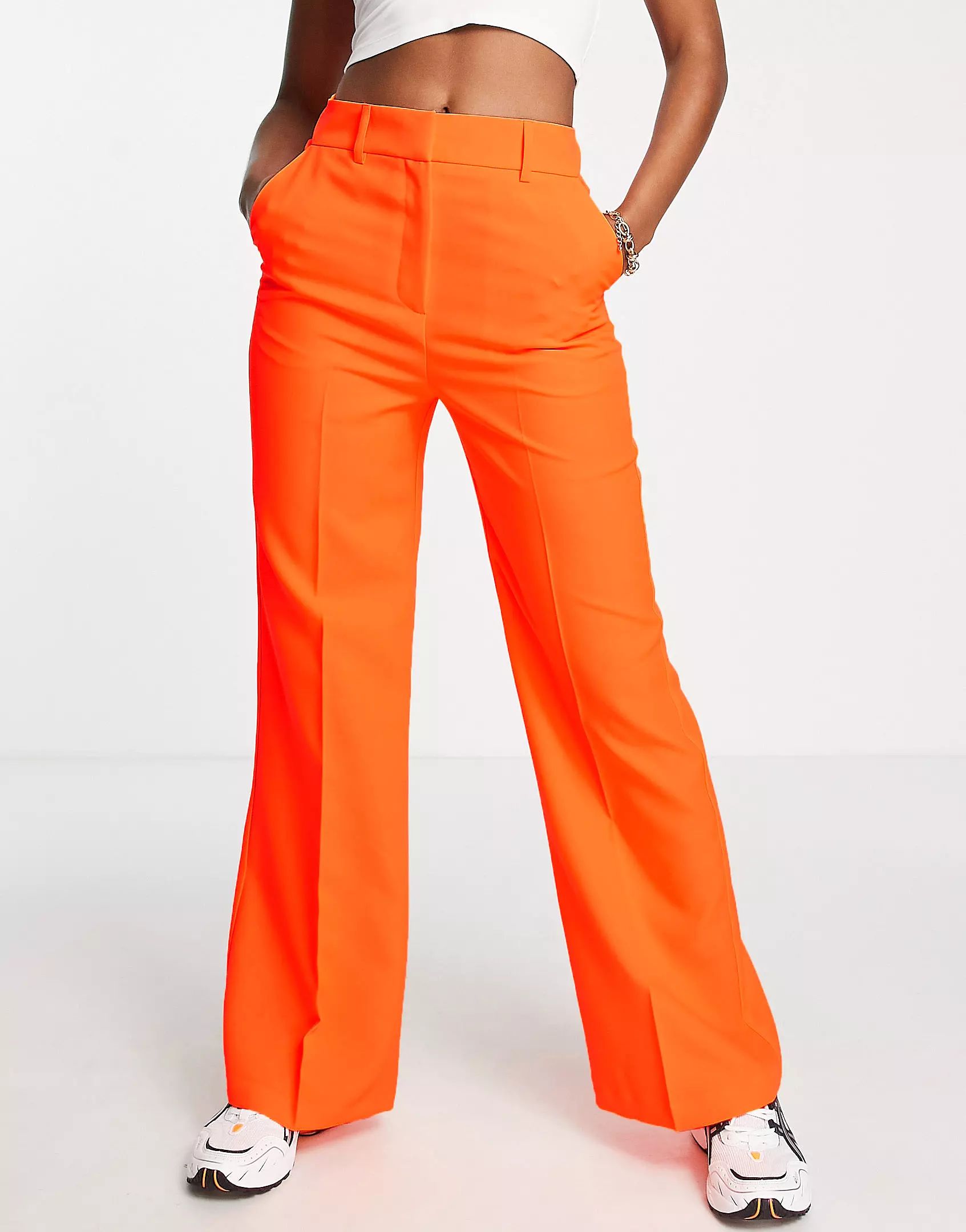 ASOS DESIGN relaxed wide leg flare trousers in orange | ASOS (Global)