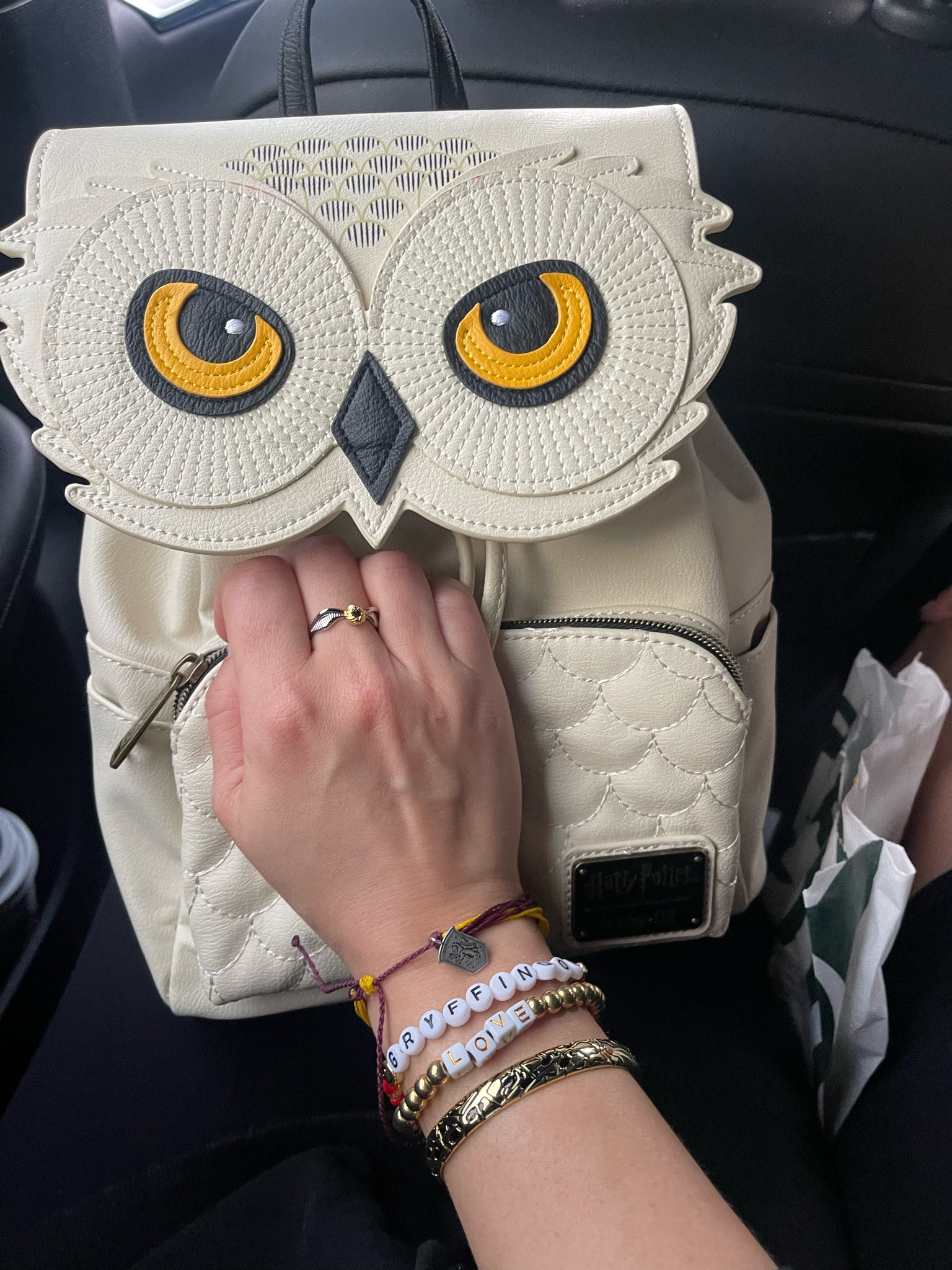 What I packed for Harry Potter world!

Backpack. Wallet. Jewelry. Accessories. Harry Potter theme park. Theme park must haves  