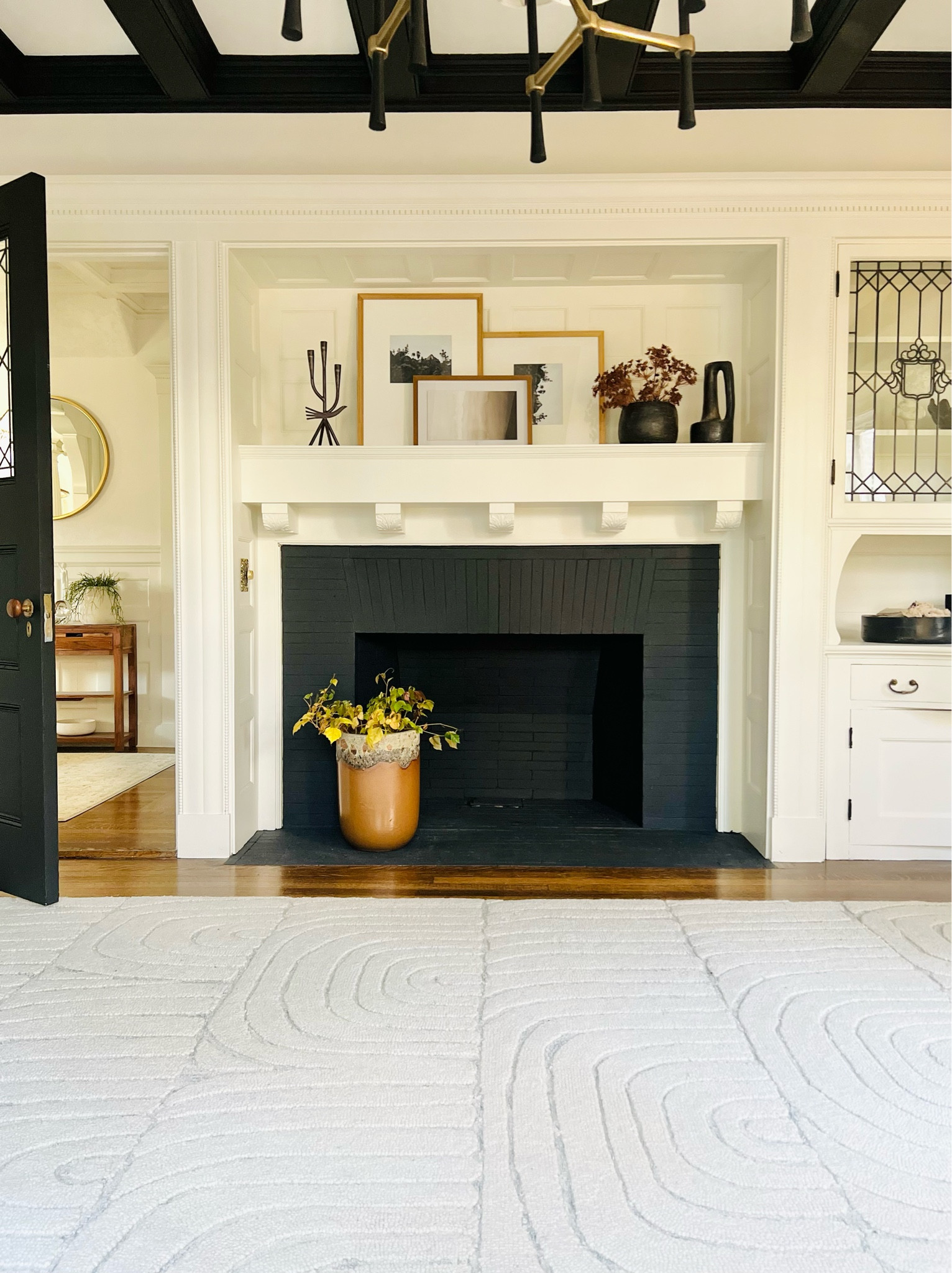 Dining room decor!
Love this fireplace transformation!
Gallery wall frames, candle holder, wood vase, faux flower stem.

#LTKFind #LTKhome #LTKstyletip