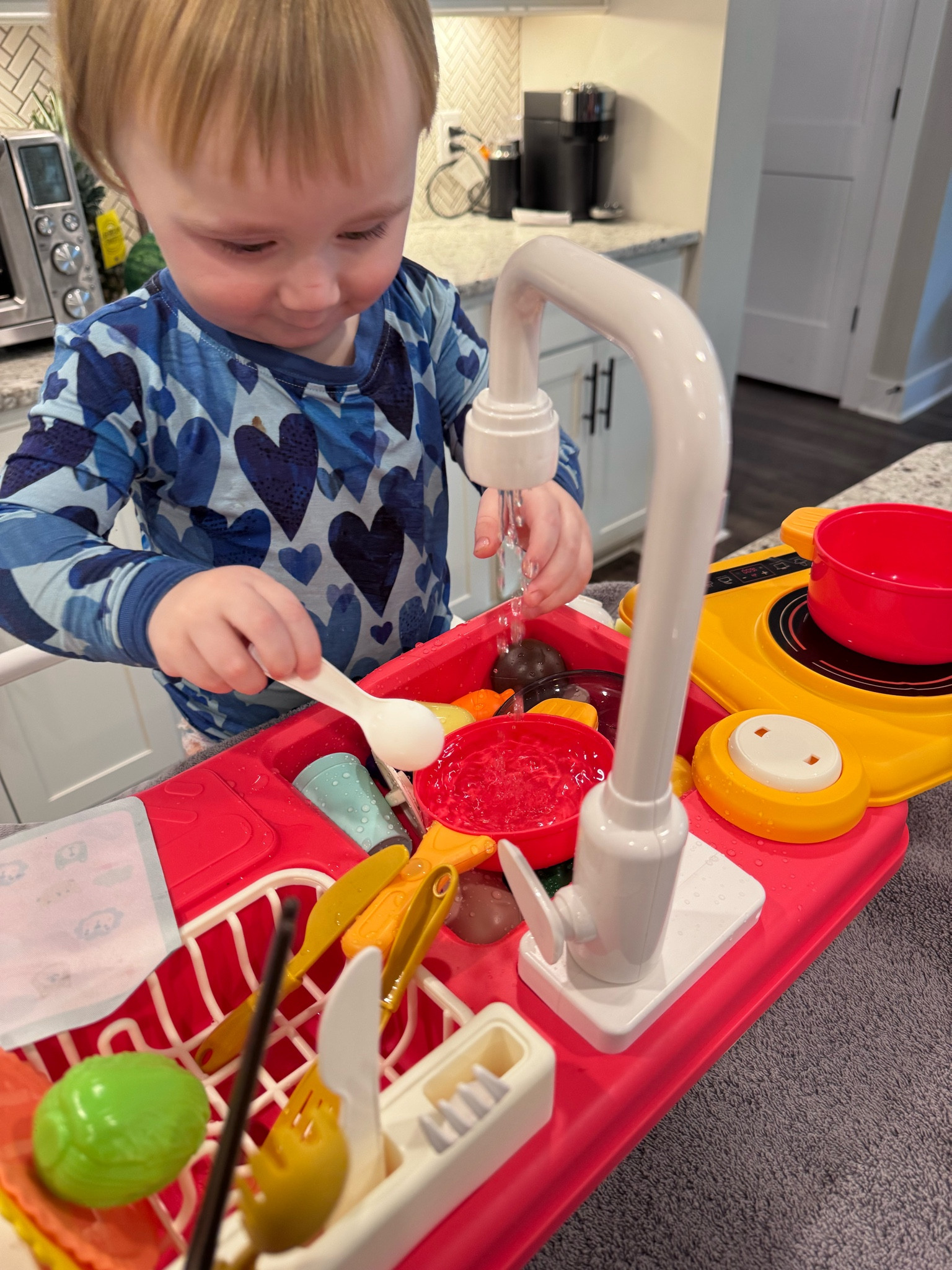 Toddler play sink with running water- kept him busy for HOURS! Would make a great Easter or Valentine’s Day gift 

#LTKKids