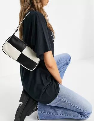 ASOS DESIGN slim 90s shoulder bag in black & off white patchwork | ASOS | ASOS (Global)