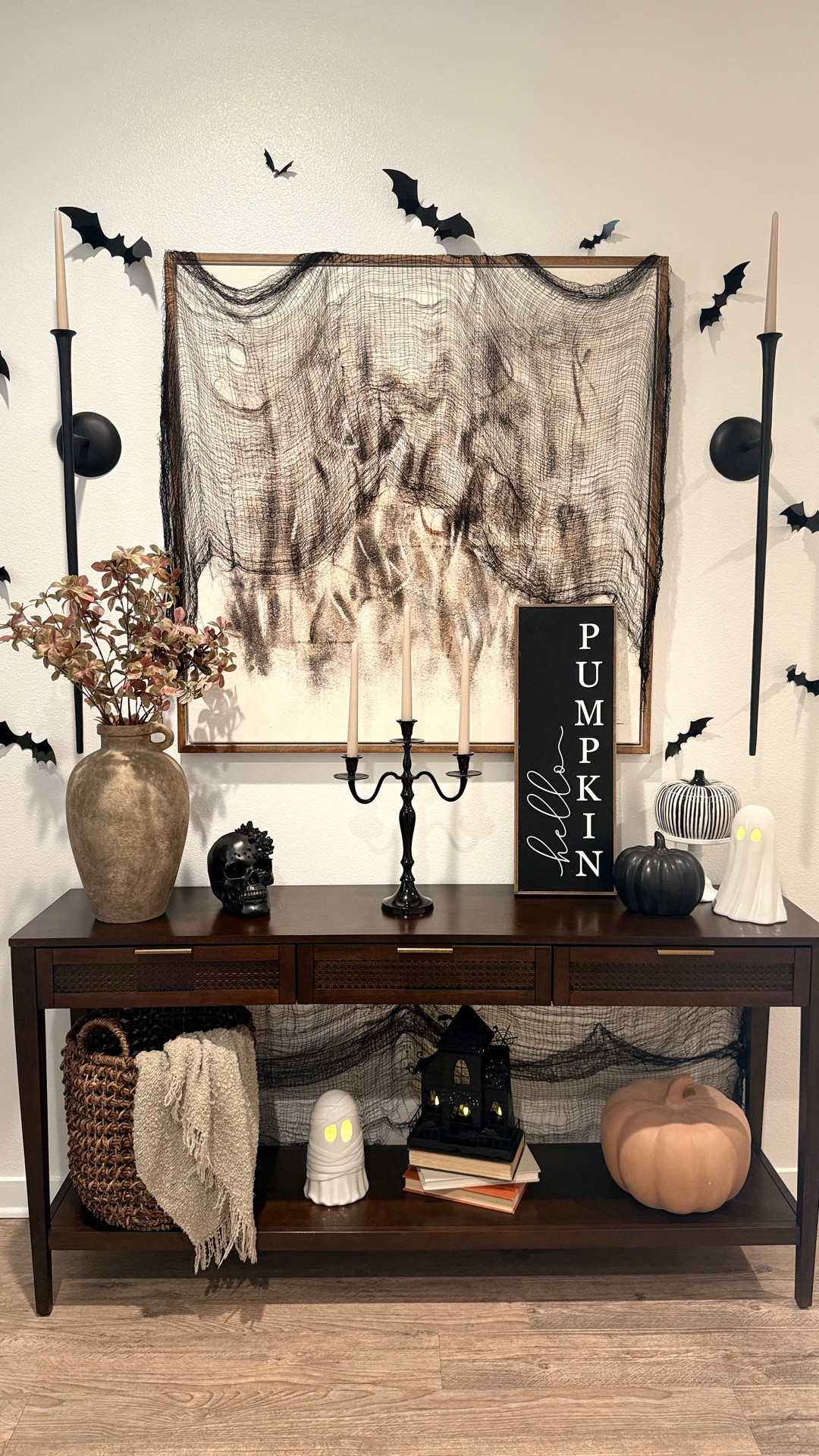 Fall-O-Ween a mix of Fall and Halloween. Simple entry table styling idea. 
•
#halloween #Fall #table 

#LTKSeasonal #LTKStyleTip #LTKHome