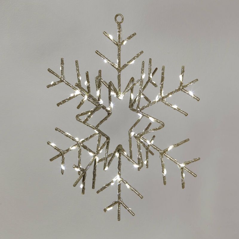 14" Battery Operated Twinkling Gold Glitter Snowflake LED Novelty Silhouette Light - Wondershop... | Target