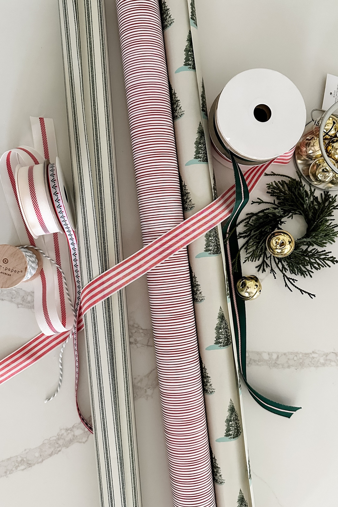 Pretty target wrapping paper, ribbon, and toppers. 😊

#LTKfindsunder50 #LTKHoliday #LTKhome