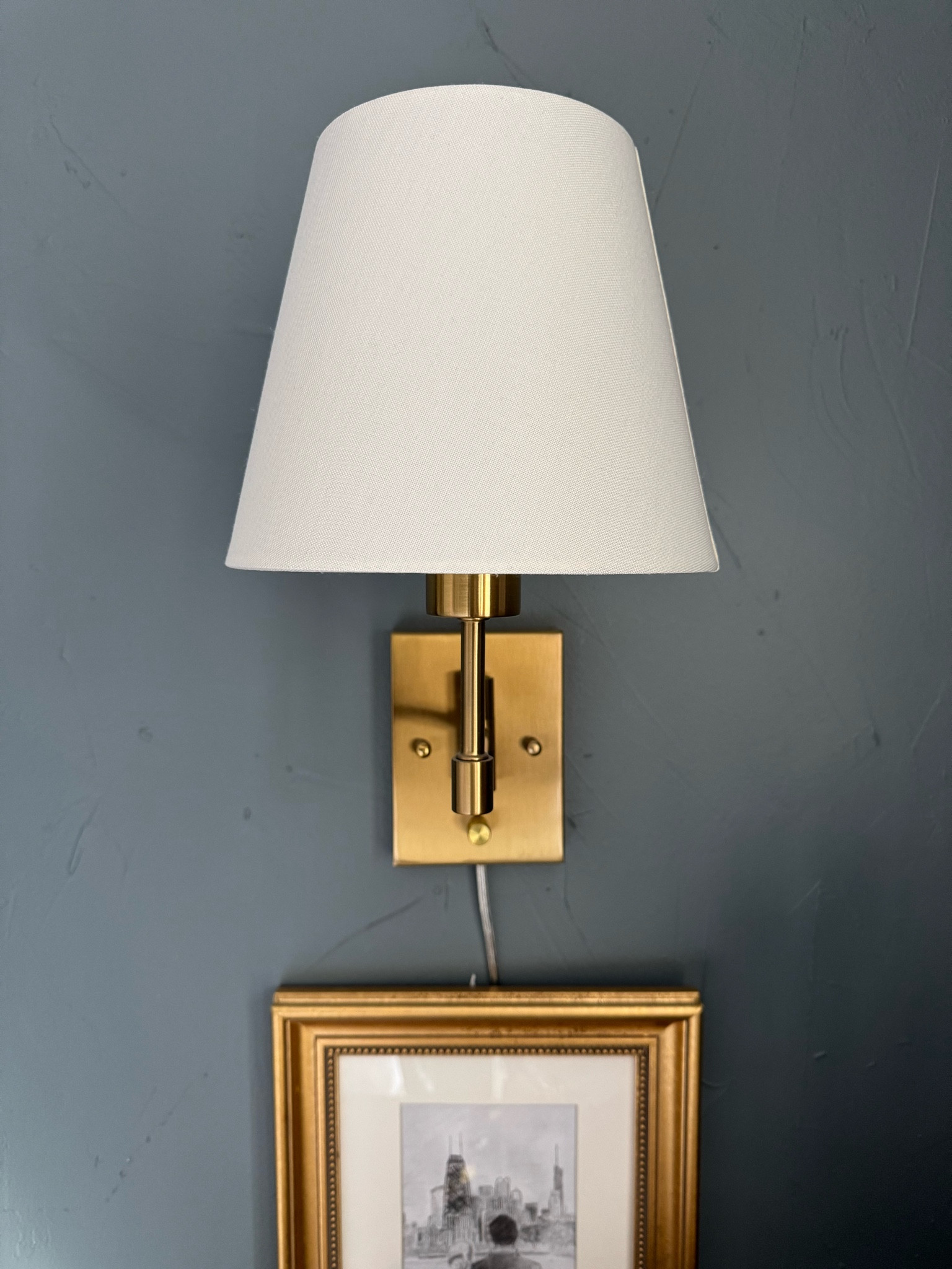 Cute and simple pair of plug-in sconces that you can put anywhere - these are on either side of the bed and they’re so affordable. And you can always change out the plastic cord to a beautiful cloth vintage one - still need to do that! 🤎