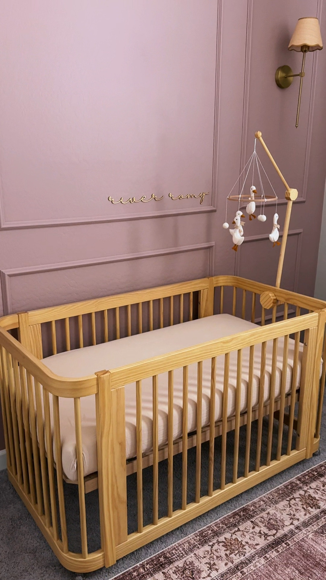 Baby girl’s Nursery reveal! Linked everything here! 

- Wall color: dressy rose sherwin Williams
- Bookshelf color: socialite by sherwin Williams
- Nesting Wave Crib in natural wood (couldn’t link)
- Dresser is color hazelnut
- Happ brand diaper caddy in color beige
- Glider in ivory boucle