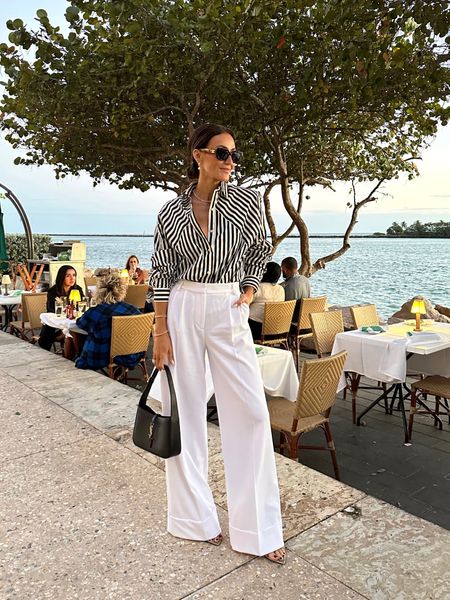 Express stripped shirt 
Miami outfit
White pleated pants  TTS/0
Stripped boyfriend shirt xs fits oversized

#LTKitbag #LTKunder100 #LTKstyletip