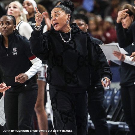 Dawn Staley courtside in Gucci 