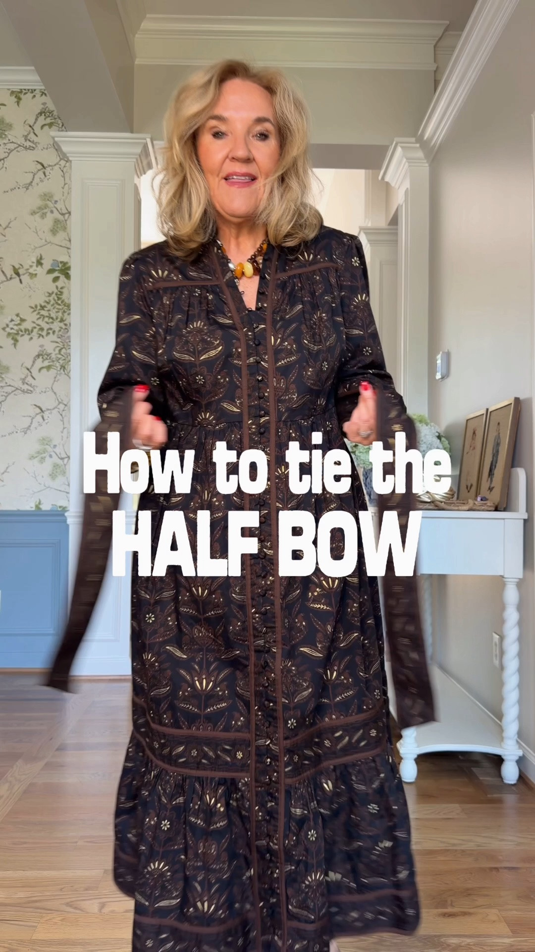 I always get asked how to tie this sash. It’s quite simple. Act like you’re tying a Knott but you don’t pull the tie all the way through. You just leave it as a loop. Hope this helps.
The dress is a beautiful cotton print with black brown and gold foil. This is a medium petite and the dress does only come in petite right now. I would say it would work to up to 5 foot five.

#LTKSaleAlert #LTKOver40 #LTKPetite