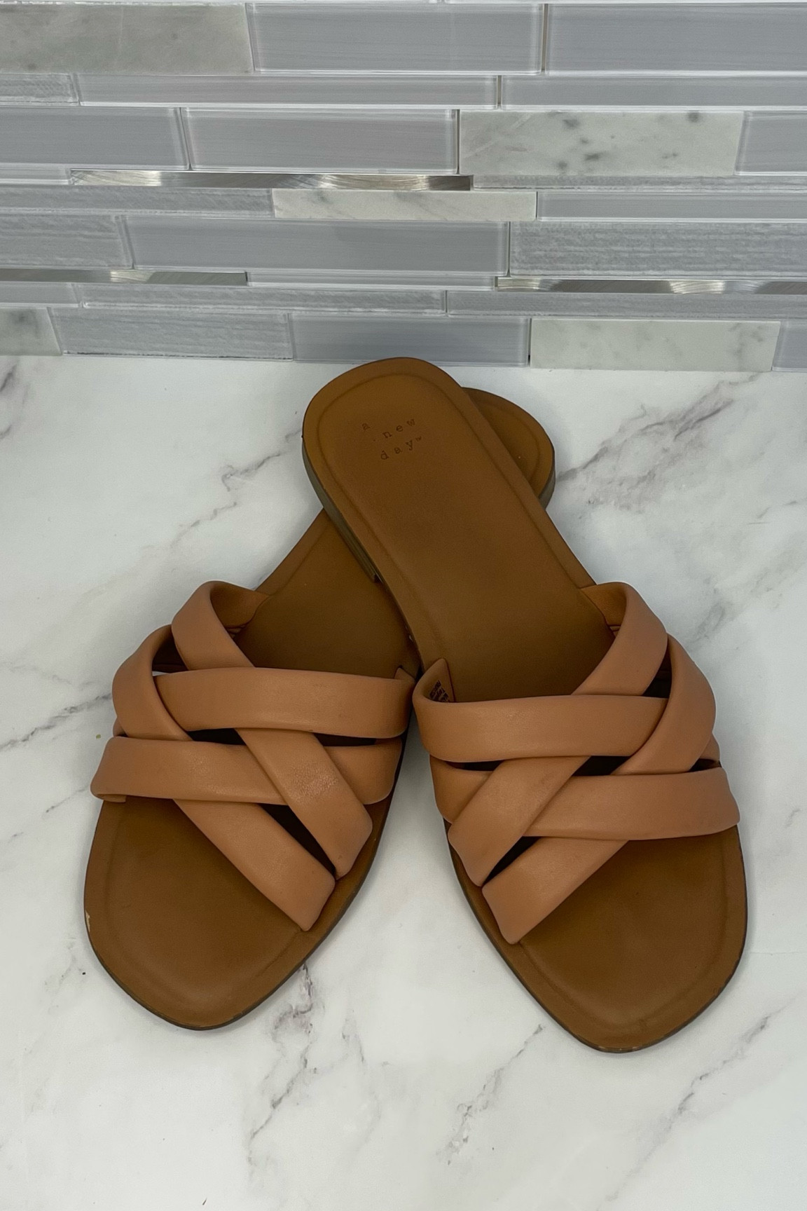 Sandals comfortable brown tan leather woven braided straps slides wide squishy 

#LTKFindsUnder50 #LTKShoeCrush
