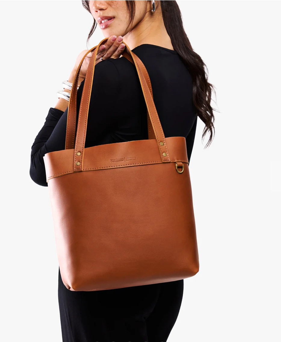 This honey-colored leather tote is the kind of bag that instantly elevates every outfit 🤍 The warm, rich tone goes with everything—from denim and knits to tailored coats—and somehow looks even better with wear. The leather feels substantial yet soft, holds its shape beautifully, and fits all the daily essentials (laptop, wallet, sunglasses, makeup pouch) without looking bulky.  #leathertote  #leather #leatherbag 

#LTKSaleAlert #LTKWorkwear #LTKootd