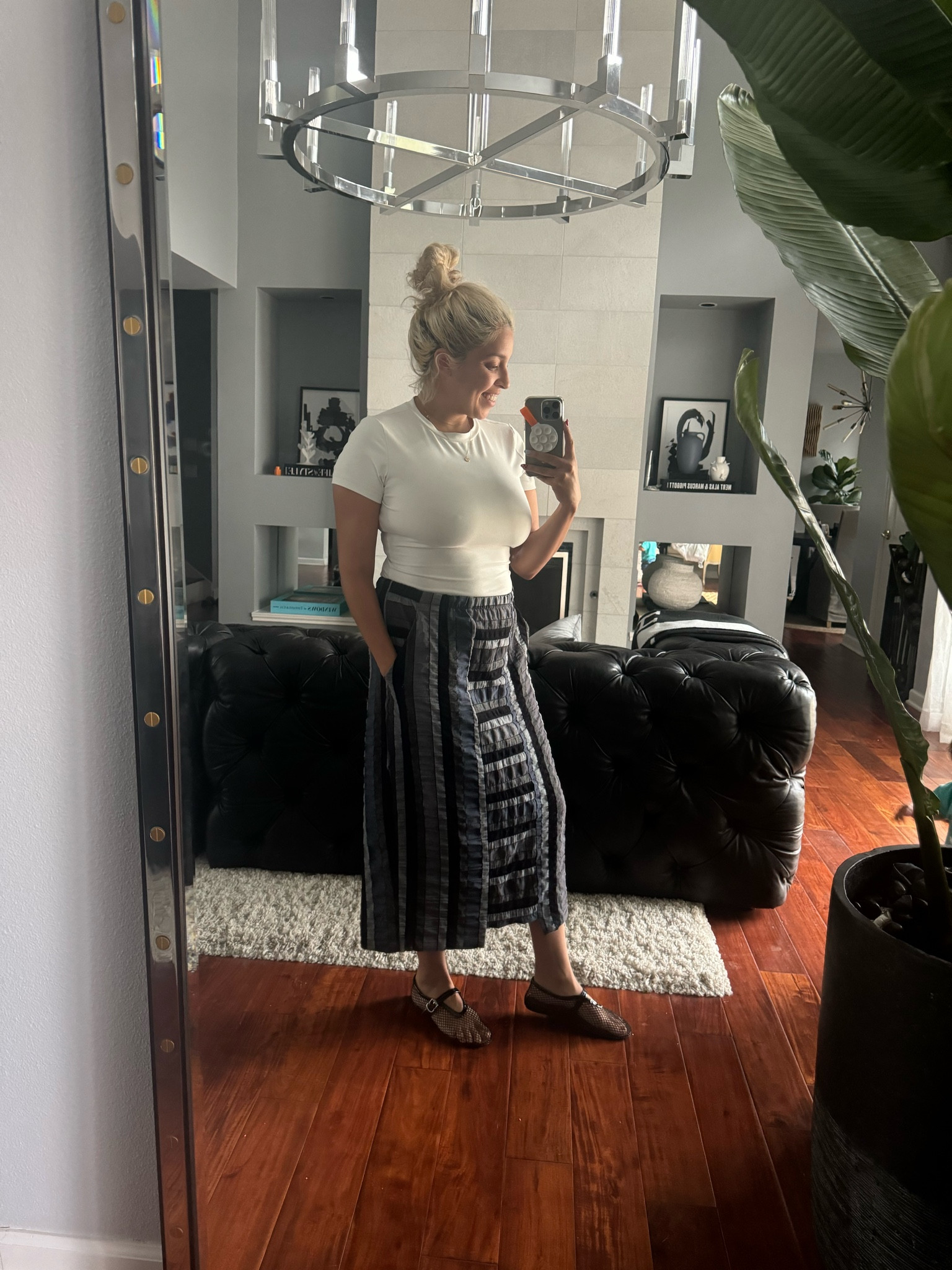 I wear these Amazon tops with everything, time for me to order more colors!  Today was just a rainy Saturday so I threw it together with this denim looking skirt I picked up at the Niche Clothing warehouse sale and my ballet flats ! I’m wearing a medium in the top, it’s TTS.

#LTKStyleTip #LTKFindsUnder50 #LTKShoeCrush