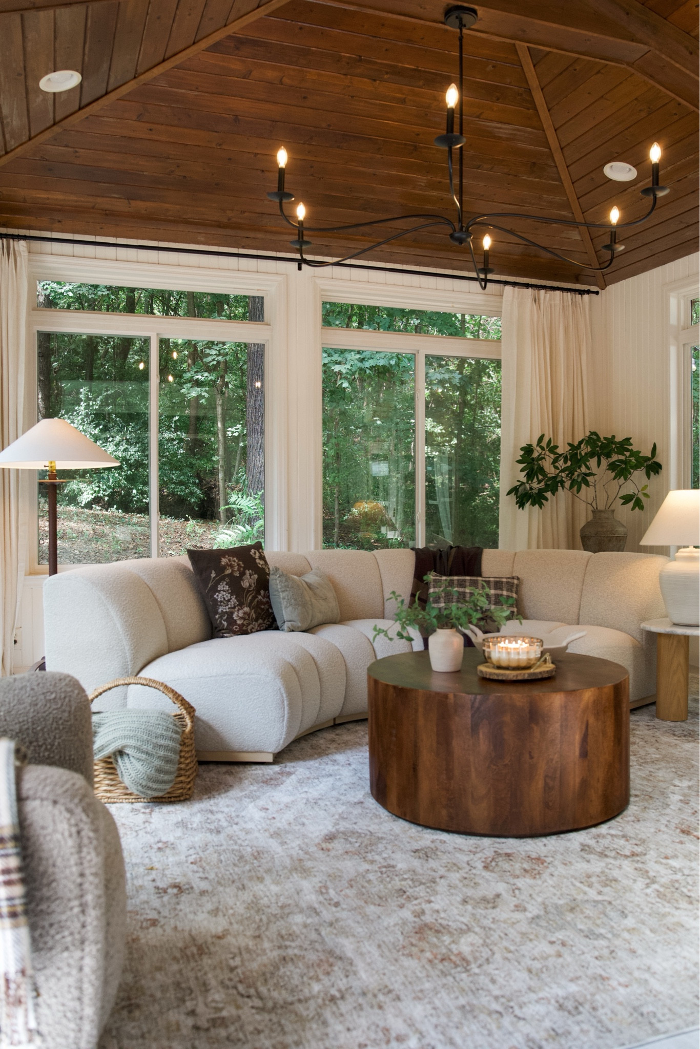 Neutral, dramatic & cozy! Obsessed with our living room design in our sunroom! 🫶🏼 the sofa is modular and can be separated or added to, plus it’s made with performance fabric 👏🏼 

#LTKStyleTip #LTKFindsUnder100 #LTKHome