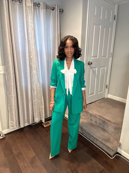  A green suit is the perfect spring outfit idea for the office! Pair it with neutral accessories and a crisp white shirt to maintain a professional yet vibrant look. #officefashion #greensuit

#LTKworkwear