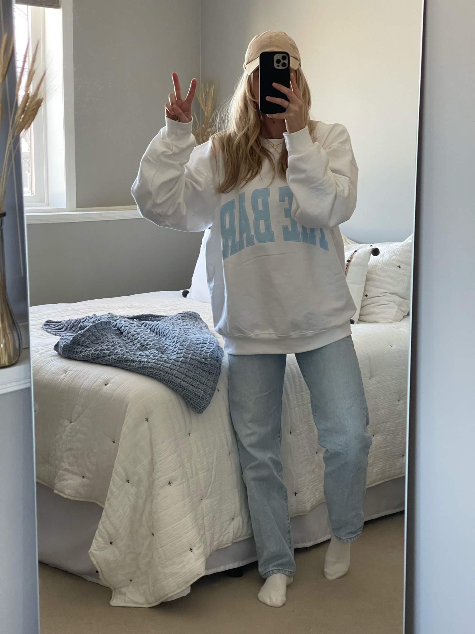 The Bar Varsity crewneck + Levi’s 

#LTKstyletip #LTKunder100