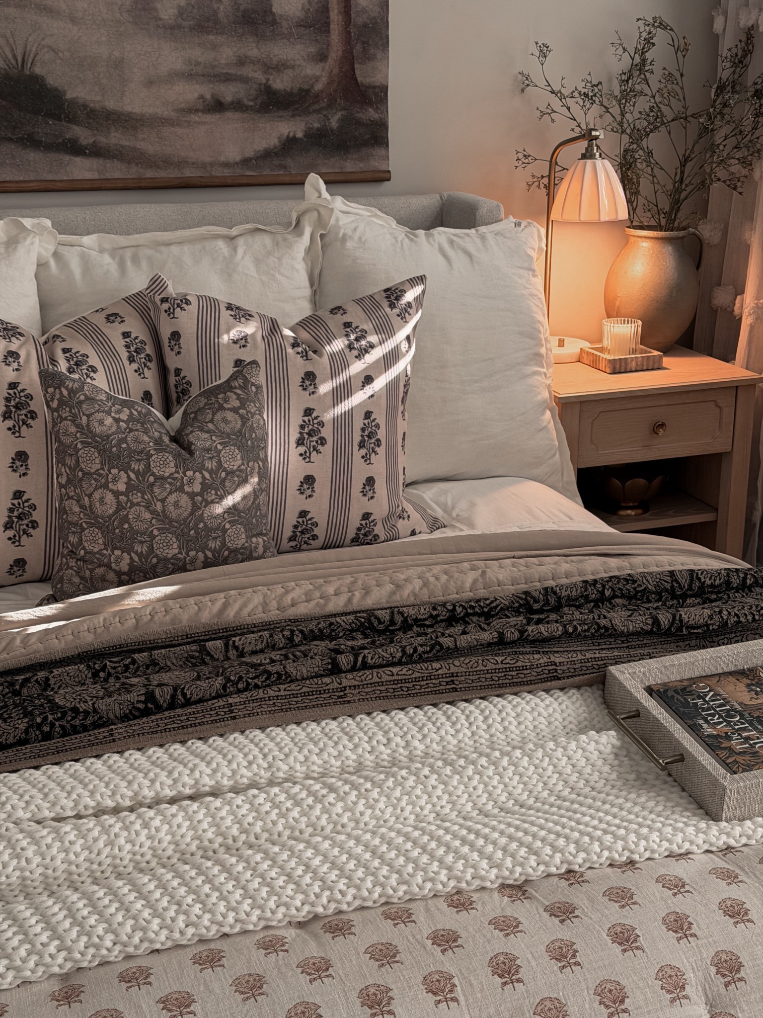My idea of a perfect bedroom—soft neutrals, moody patterns, and cozy layers. Linked here.

#MoodyBedroom
#CozyBedroom
#LayeredBedding
#NeutralBedding
#ThrowPillowStyling
#TexturedThrow
#Bedscape
#NightstandStyling
#BedsideLamp
#WarmLighting
#CeramicVase
#DecorTrays
#ModernOrganicHome
#TimelessDecor
#SoftNeutrals
#WarmMinimalism
#LTKHome
#LTKFinds
#ShopMyBedroom

#LTKHome