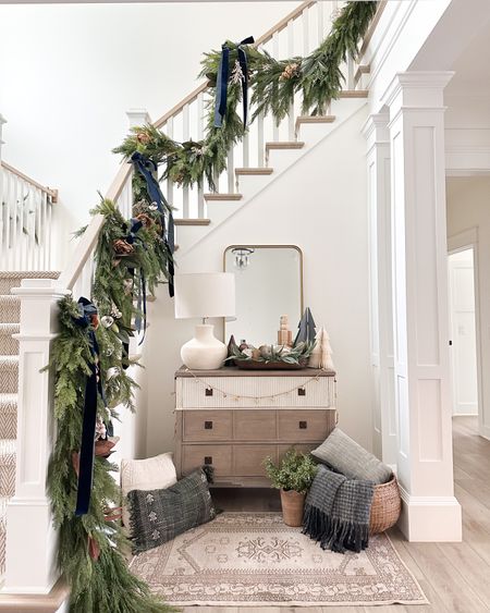 A moment for the staircase! I absolutely love how found and peaceful it turned out this year. Linking what I can below! 

#garland #christmas #christmasdecor #holidaydecor #entryway

#LTKSeasonal #LTKHoliday #LTKstyletip