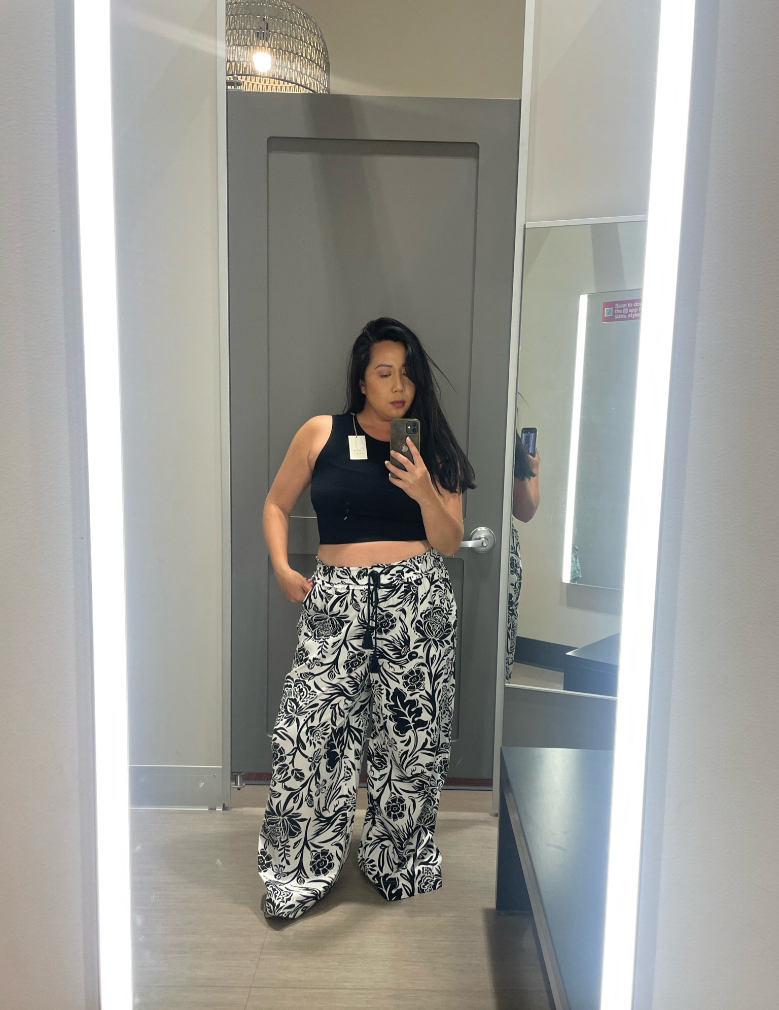 Whoever said resort wear had to be all breezy dresses and floppy hats clearly hasn't seen this monochrome outfit. With wide-legged patterned pants that elongate your legs and a comfy crop top that flatters your midsection, this look strikes the perfect balance between comfort and style. You'll feel like a fashion icon lounging by the pool or sipping drinks at the bar. Trust me, this outfit is so hot, you'll need to pack SPF, but don't worry - you won't be feeling clingy or weighed down, even under the scorching sun. #ResortReady #MonochromeMagic #PantsForDays

#LTKcurves #LTKSeasonal #LTKtravel