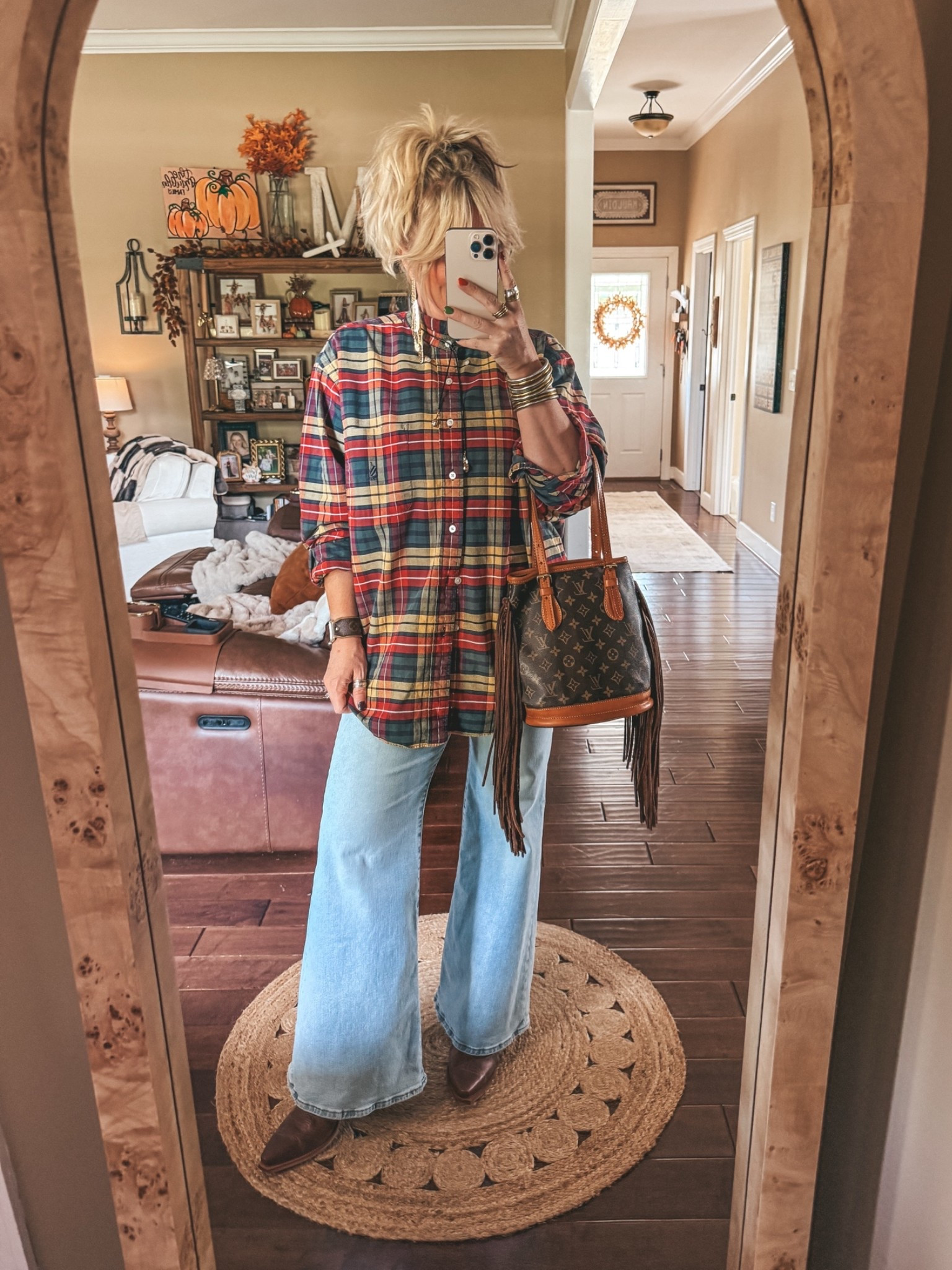 Love it with flare jeans. These jeans a I sized up one in. They are Levi’s 
Thrifted men’s button down L
Levi’s size 30
Boots true to size

#LTKOver40