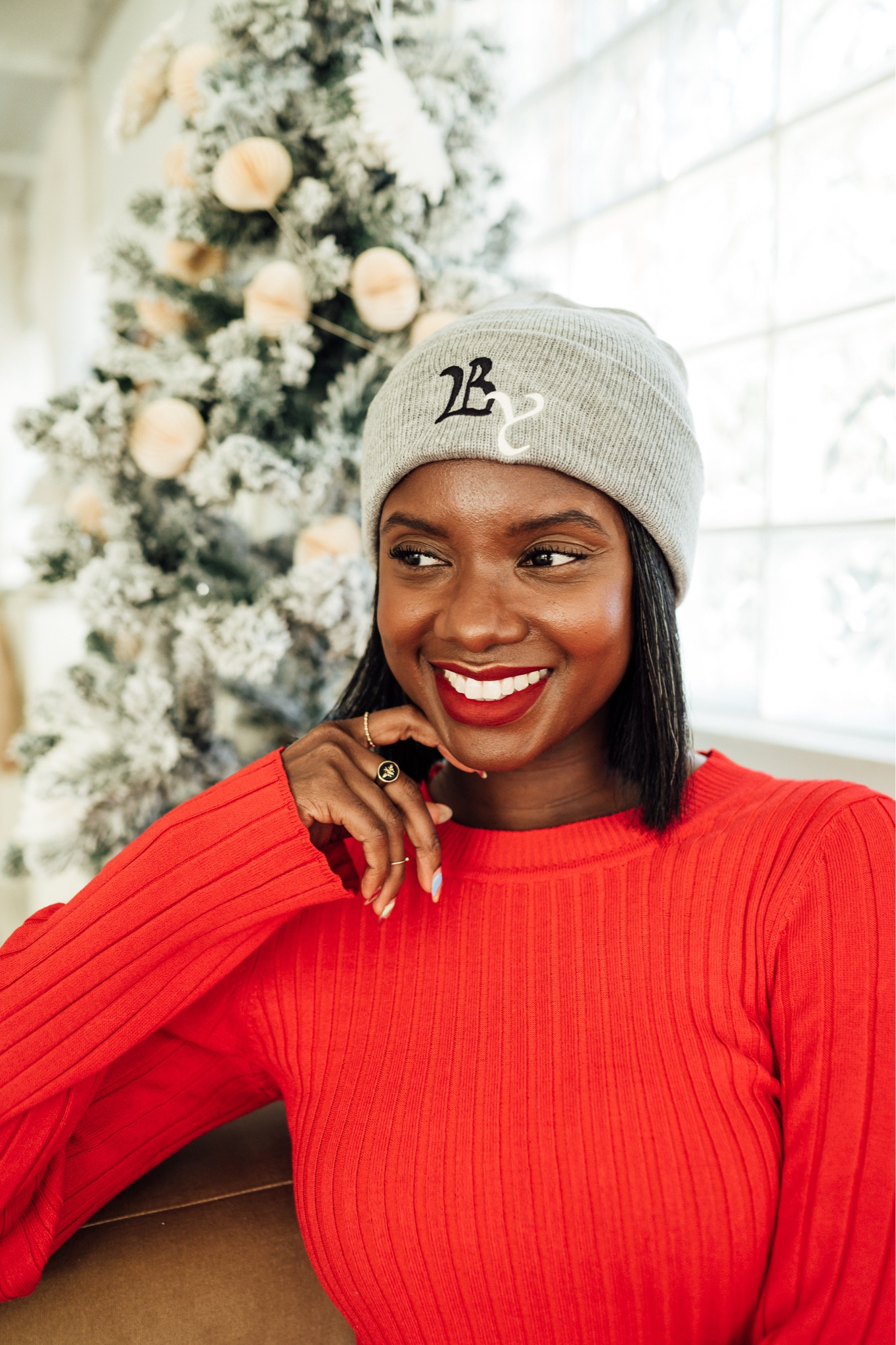Gray beanie hat paired with a red sweater dress for holiday dressing. Lip bar has the perfect red lip for the holidays. This shade is hot mama. I also like Bawse lady for a darker red  

#LTKunder50 #LTKstyletip #LTKHoliday