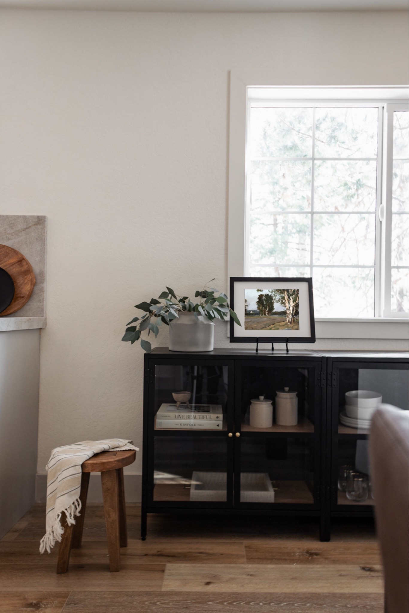 Target cabinet and decor! I installed the back panel backwards to show the black instead of faux wood grain

Shop the Memorial Day Sale at collectionprints.com and save up to 60% off on all art and frames! This is the 40x30” natural float frame canvas 

#LTKhome #LTKsalealert #LTKSeasonal