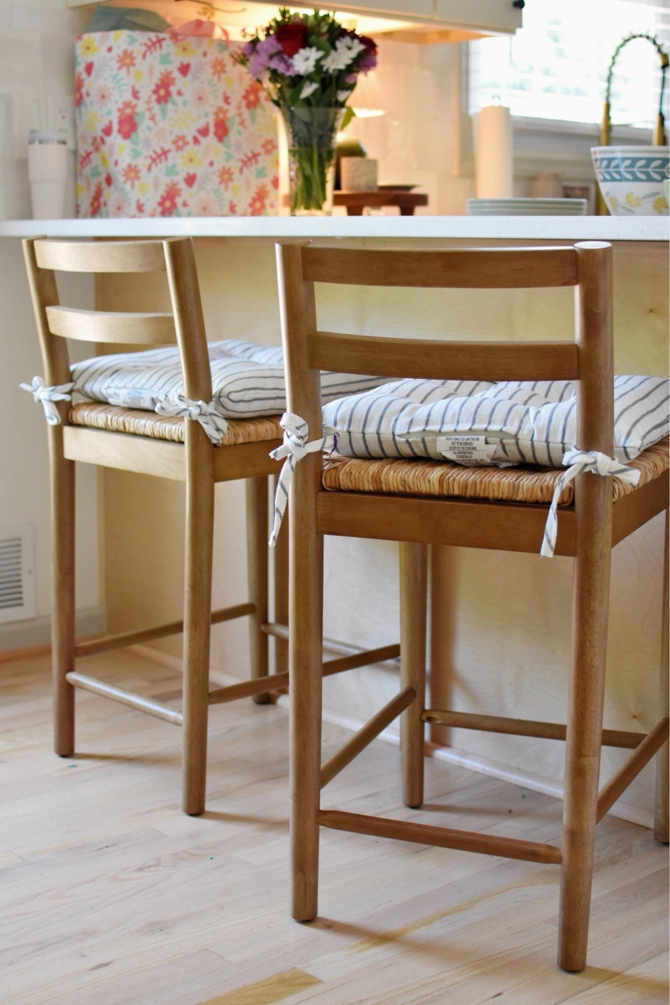 I replaced our upholstered counter stools with wooden ones in hopes that we can keep them clean. 🙈 These kids are messy!

#LTKdayinmylife #LTKHome #LTKmomlife