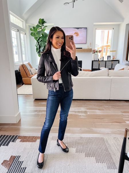 Fall outfit with white sweater, leather jacket and the best dark wash jeans! The jeans are very comfortable and stretchy. I love the dark wash color, because it pairs well with any top. 

#LTKstyletip #LTKSeasonal