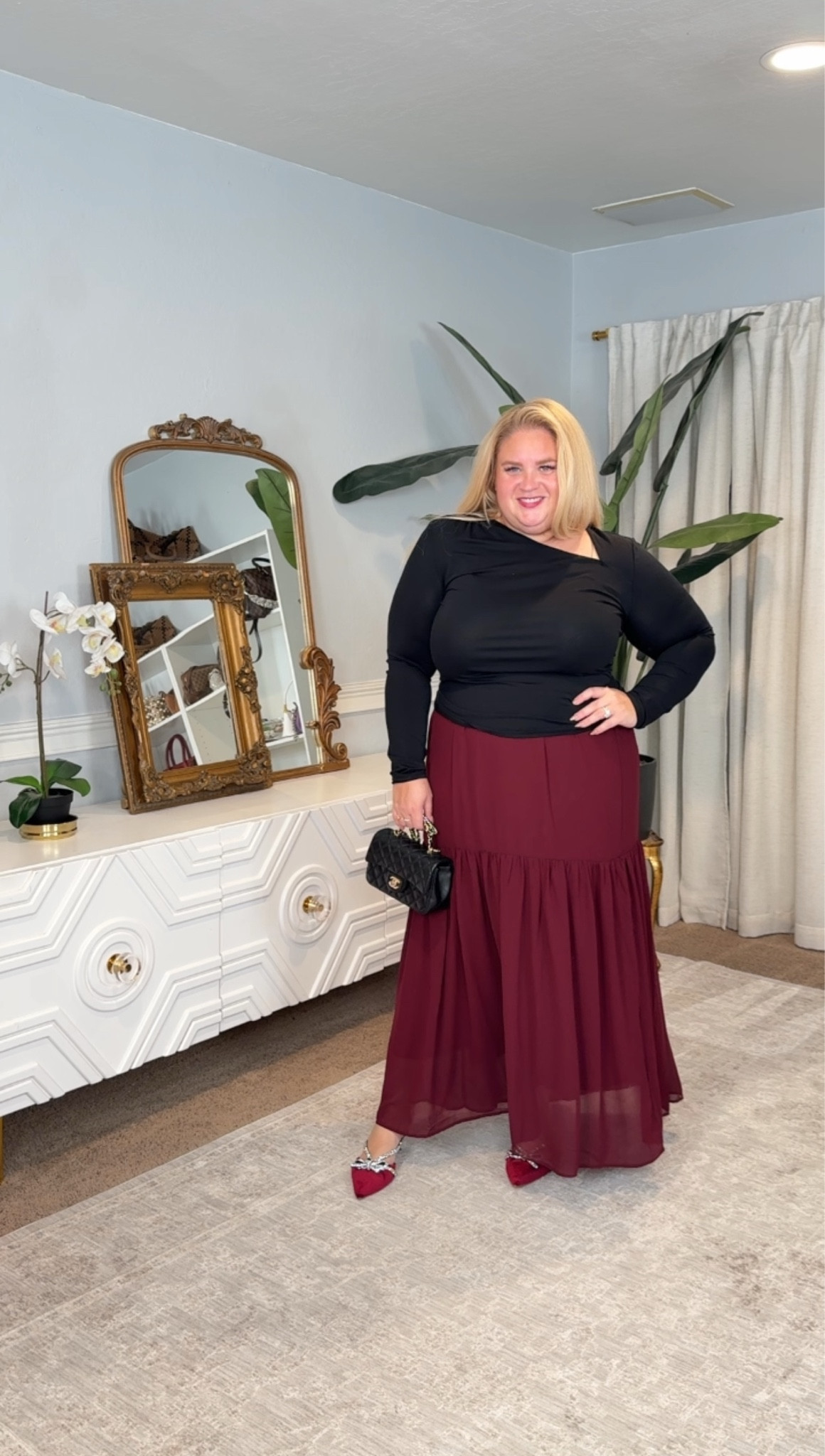 This outfit is quiet luxury meets holiday glam. 🍷
The draped neckline on this black top feels so elevated, and the flowy burgundy skirt adds movement that’s both elegant and comfortable. Finished with jeweled flats and a classic bag for a polished, effortless look.

🖤 Draped long-sleeve top (super flattering)
🍷 Tiered chiffon maxi skirt
💎 Embellished pointed flats
👜 Quilted crossbody

#LTKFindsUnder50 #LTKStyleTip #LTKPlusSize