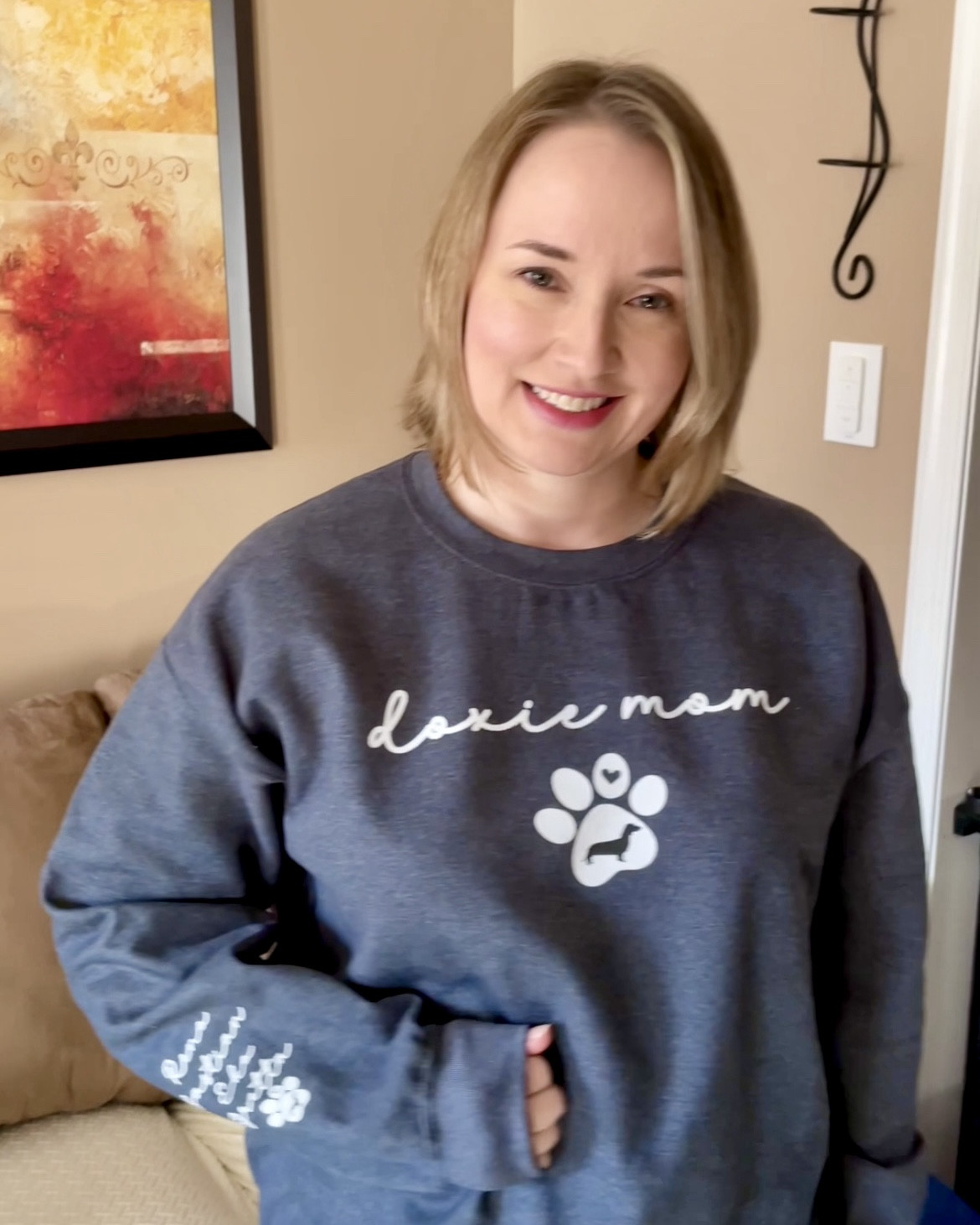 Adorable doxie mom sweatshirt with customizable sleeve.🐾♥️.
#doxiefinds #dachshundmom

#LTKOver40 #LTKGiftGuide #LTKPets