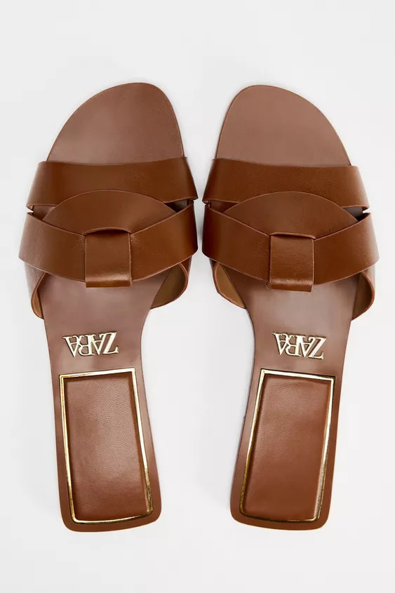 Flat leather slider sandals with criss-cross straps on the front.Sole height: 1 cm. / 0.3″ | Zara US