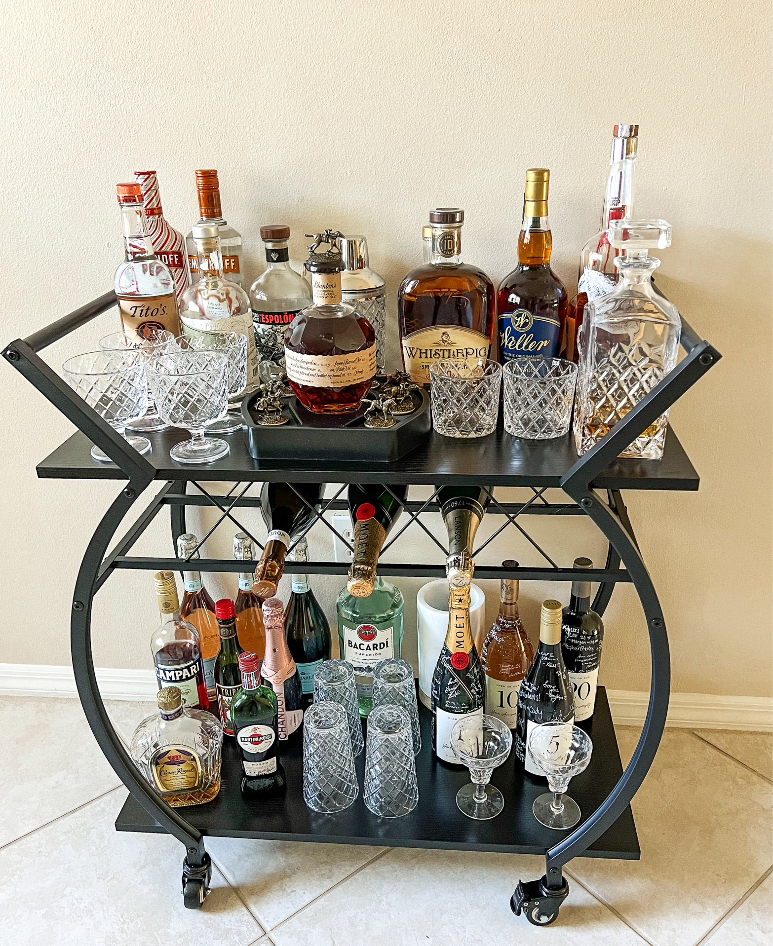 So excited about our new bar cart!! This was the perfect way for us to display our wedding guest book wine bottles along with so many of our favorite glasses and bottles we received as gifts! 🤍

#LTKwedding #LTKparties #LTKhome
