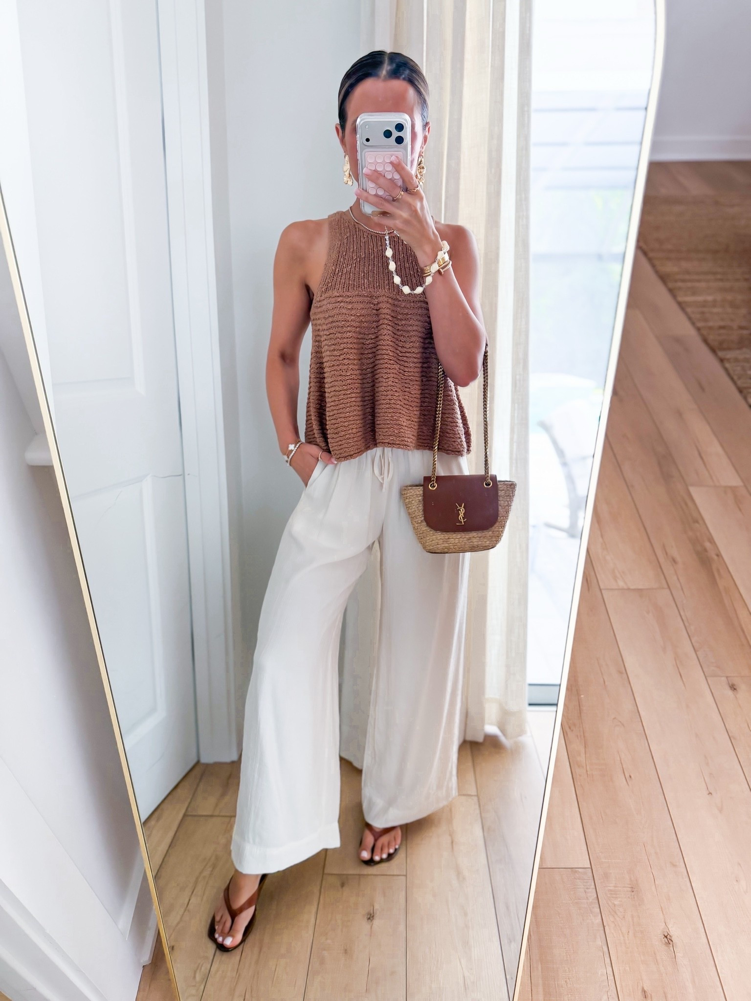 My dinner outfit. Summer outfit. Elevated casual outfit. Resort outfit. Resort wear. Vacation outfit. Europe outfit. New wide leg crinkle pants from Abercrombie in XXS short. Anthropologie sweater tank in XXS. Amazon jelly sandals are TTS. YSL raffia bag.

#LTKootd #LTKTravel #LTKPetite