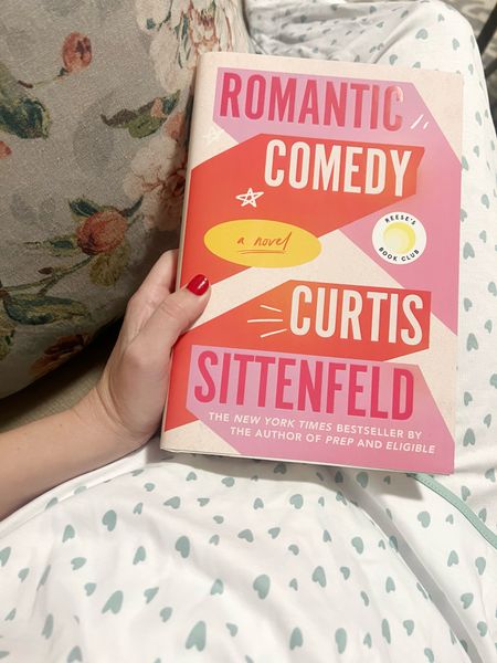 New book! Book recommendation. Amazon finds. 
“Romantic Comedy” by Curtis Sittenfeld

* synopsis *

“ Sally Milz is a sketch writer for The Night Owls, a late-night live comedy show that airs every Saturday. With a couple of heartbreaks under her belt, she’s long abandoned the search for love, settling instead for the occasional hook-up, career success, and a close relationship with her stepfather to round out a satisfying life.

But when Sally’s friend and fellow writer Danny Horst begins dating Annabel, a glamorous actress who guest-hosted the show, he joins the not-so-exclusive group of talented but average-looking and even dorky men at the show—and in society at large—who’ve gotten romantically involved with incredibly beautiful and accomplished women. Sally channels her annoyance into a sketch called The Danny Horst Rule, poking fun at this phenomenon while underscoring how unlikely it is that the reverse would ever happen for a woman.

Enter Noah Brewster, a pop music sensation with a reputation for dating models, who signed on as both host and musical guest for this week’s show. Dazzled by his charms, Sally hits it off with Noah instantly, and as they collaborate on one sketch after another, she begins to wonder if there might actually be sparks flying. But this isn’t a romantic comedy—it’s real life. And in real life, someone like him would never date someone like her . . . right?

With her keen observations and trademark ability to bring complex women to life on the page, Curtis Sittenfeld explores the neurosis-inducing and heart-fluttering wonder of love, while slyly dissecting the social rituals of romance and gender relations in the modern age.”
.
.
.
…. #books 

#LTKfindsunder50 #LTKfindsunder100 #LTKtravel