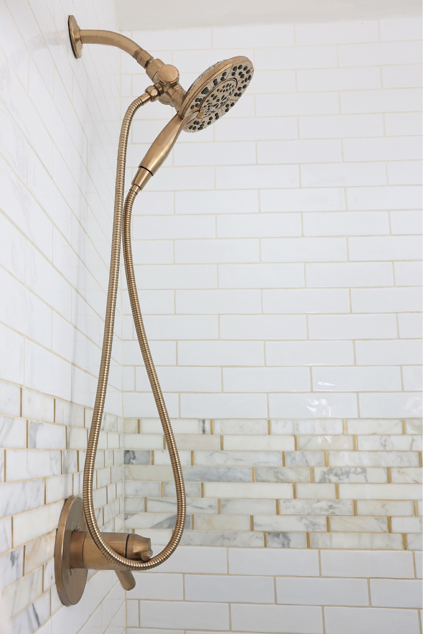 Flexible champagne gold shower head | Beautiful champagne brass, removable handheld shower head, with various water spray options 🚿 | 4-sprayer rain head + strong jet 

#LTKHome