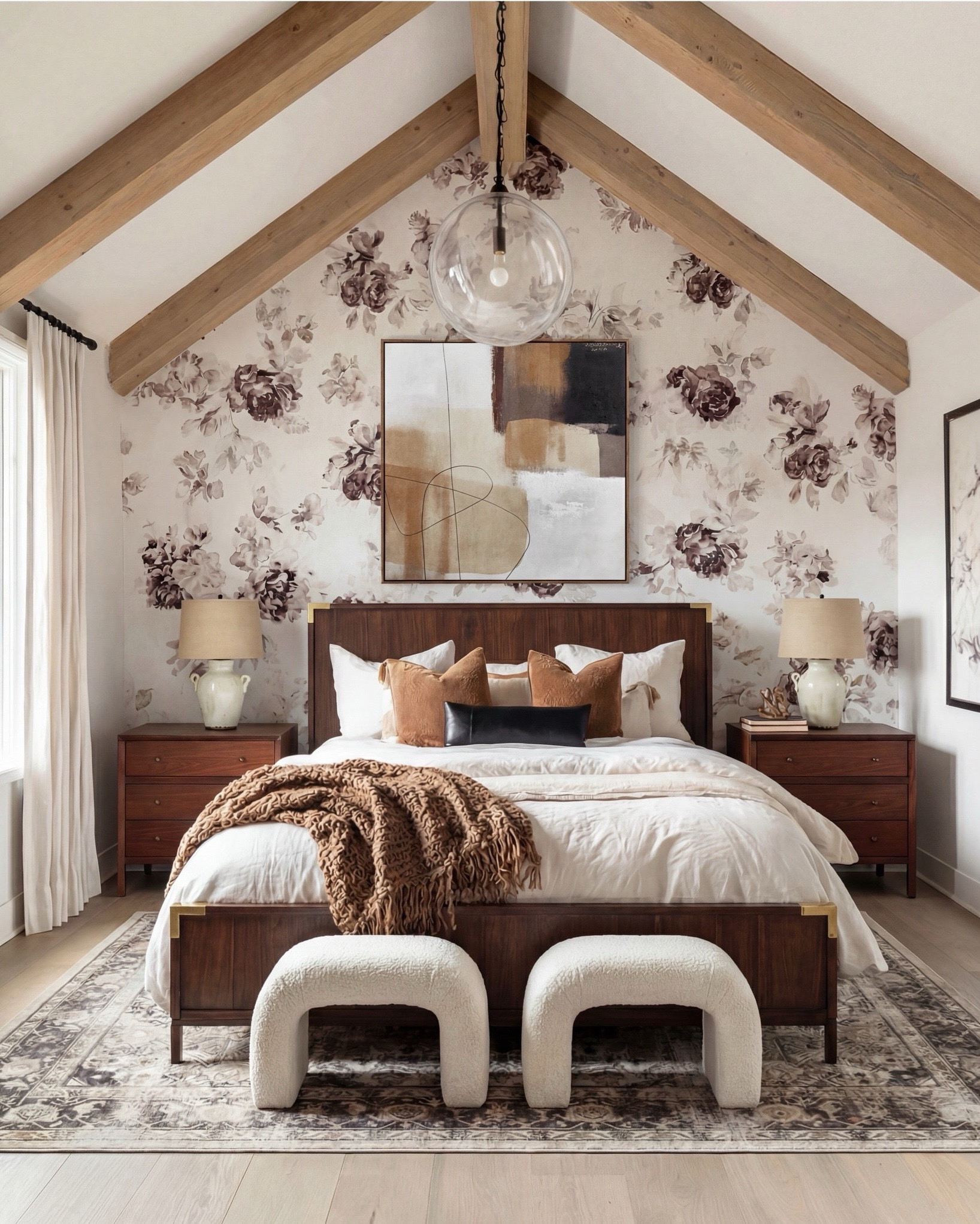 Shop the Look:
• Floral wallpaper (taupe, mauve, soft brown tones)
• Walnut wood bed with brass corner accents
• Cream duvet with layered neutral bedding
• Caramel + rust throw pillows
• Black lumbar pillow (matte leather look)
• Chunky caramel knit throw
• White ceramic bedside lamps
• Walnut 3-drawer nightstands
• Bouclé curved stools
• Neutral vintage-style rug with soft brown pattern
• Abstract wall art (warm neutrals + charcoal

#LTKsale #LTKhome #LTKstyletip