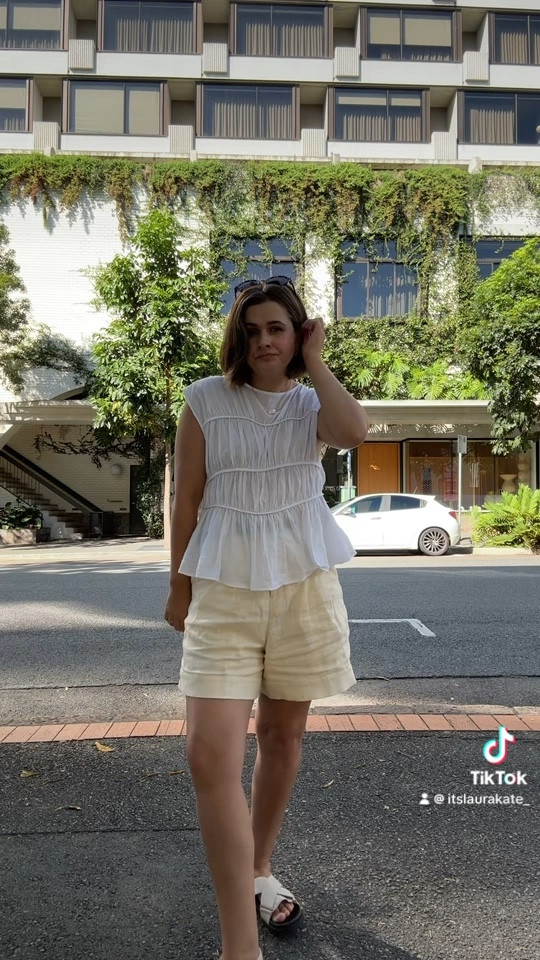 I am a standard size 10 and I sized down in the top and up in the shorts. 
Wearing size 8 top and size 12 shorts  