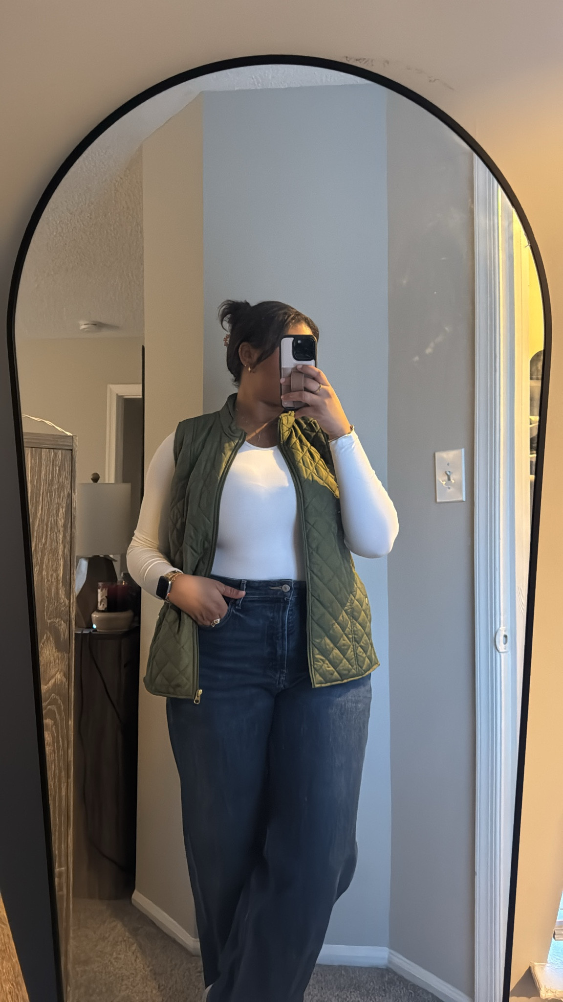 Keeping it casual and cozy for Friday vibes! 🙌✨ Loving this quilted green vest paired with a simple white long-sleeve top and wide-leg denim for a chic yet laid-back look. Perfect for running errands or grabbing coffee before the weekend kicks off. Shop this casual Friday outfit now on my LTK! #CasualFriday #OOTD #LTKstyletips

#LTKWorkwear #LTKStyleTip