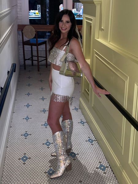 Bachelorette outfit for the bride! Sparkles and sequins are a must!

Sparkle boots
White skirt
Sequin crop top
Bachelorette 
Bride


#LTKstyletip #LTKfindsunder100 #LTKparties