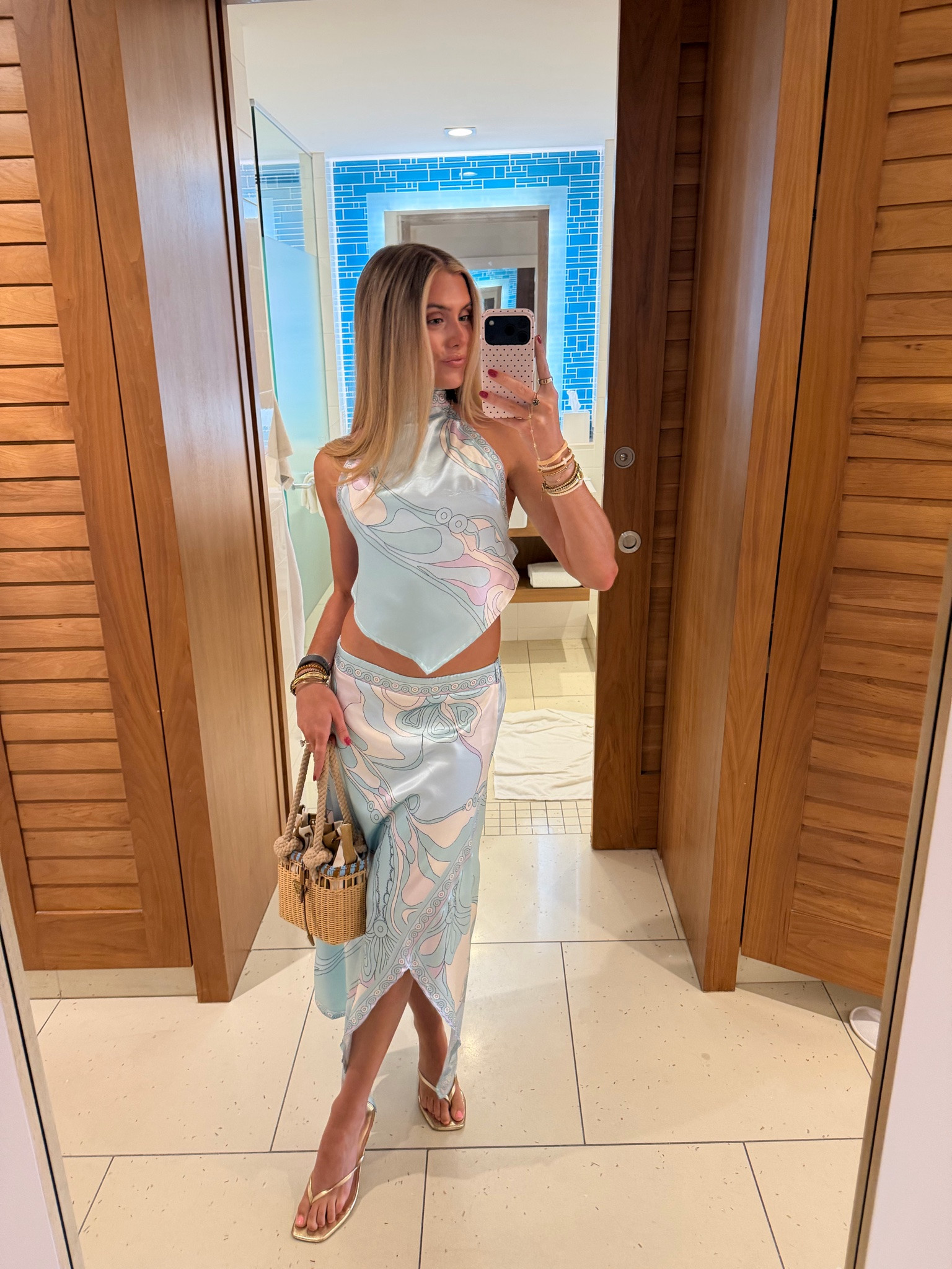 My outfit for the night in the Bahamas my matching skirt set is amazon! Amazon size small Wuitrie Two Piece Skirt Set for Women Summer Fashion Printed Satin Hanging Backless Top Irregular Midi Skirt Trendy Set. It’s a pucci look for less. My kitten heels are from Walmart. My bag is @Vivrelle   my code is SLOANEVOSEN.

#LTKootd #LTKTravel #LTKdayinmylife
