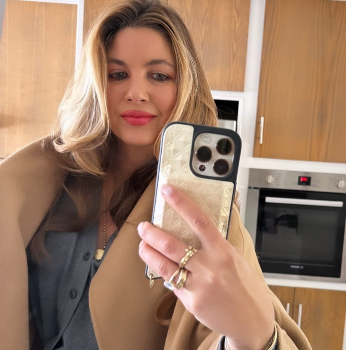 Red lips, coral lips, camel coat, cream lipstick 

💄 When you want to instantly brighten your face…this hydrating coral pink red lip color takes care of business. Shade: Reef

#LTKFind