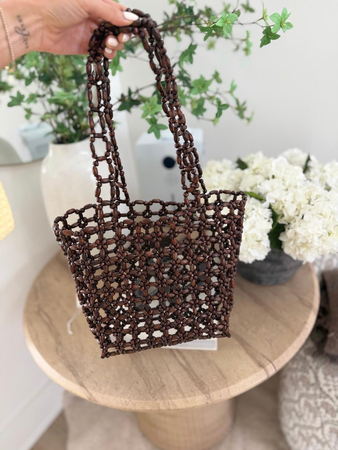 This woven tote bag is the perfect summer accessory. The textured design adds an elevated touch to simple outfits while still being practical enough to carry everything you need for beach days, errands, or travel.

woven tote bag, summer tote, beach bag, vacation accessory, straw bag, resort style, summer fashion accessories, everyday tote, neutral accessories, travel essentials, annabrstyle

#LTKdayinmylife #LTKTravel #LTKSeasonal