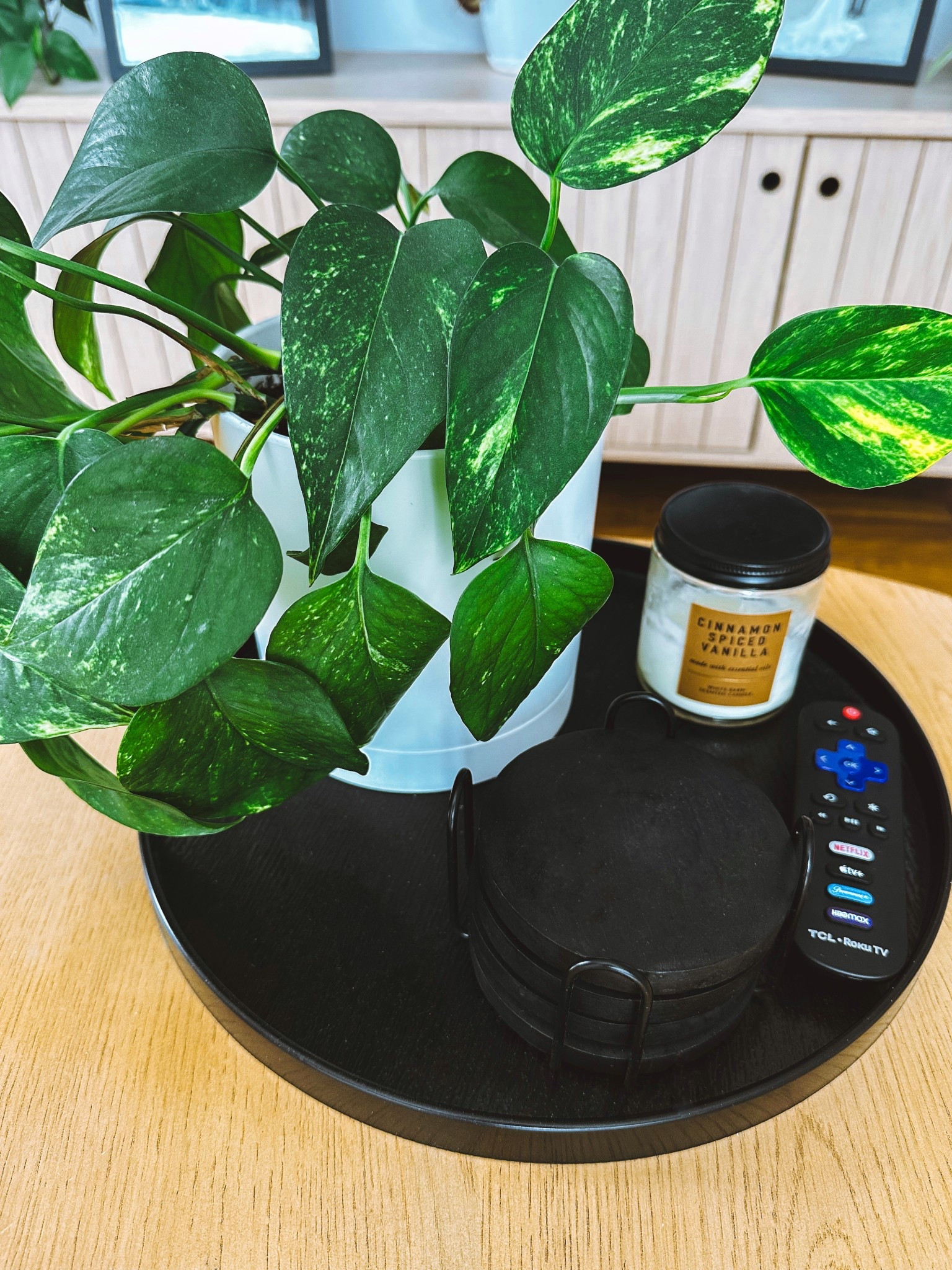My coffee table decor! The perfect little tray to hold my plant, coasters, candle, and remote! These candles smell amazing and look so nice!

#LTKHome