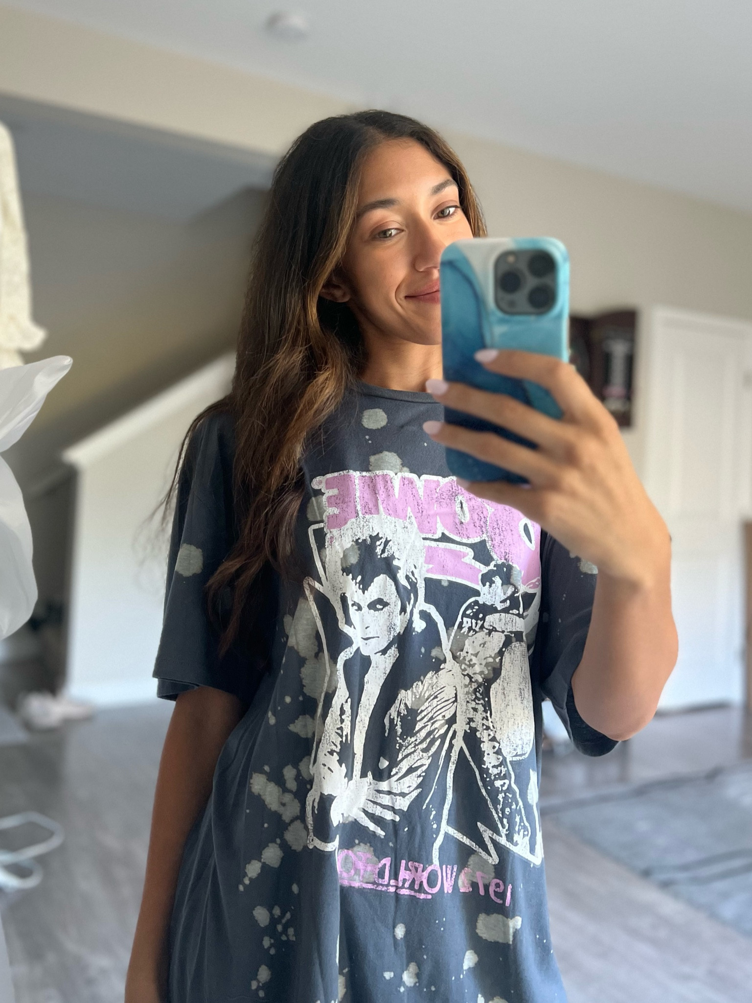 Oversized graphic tee UNDER $20?! Super soft and lightweight. No need to size up. I’m in a small and I could have gone down a size. 

#LTKU #LTKunder50 #LTKFind