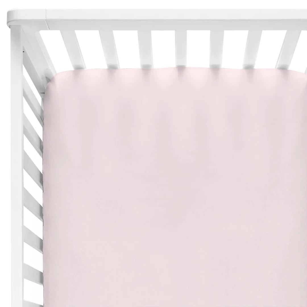 Solid Blush Bamboo Knit Crib Sheet | Caden Lane
