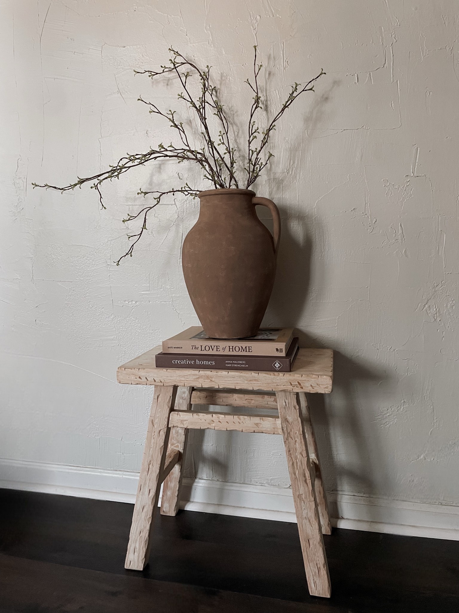 My current favorite book stack combo 😍🤎 The love of home book is the most beautiful warm beige color. The brown title matches the color of the creative homes book perfectly😮‍💨👌🏼

The vase is a DIY with a vase from Home Goods. It’s reminds me so much of those vintage Turkish artisan vases. I linked similar ones that I am obsessed with!

The stems are from Hobby Lobby but I listed some that I think would give a similar look. 

The stool is the Thatcher stool from Target that I DIY’d to make it look more aged and rustic🤎

#LTKHome
