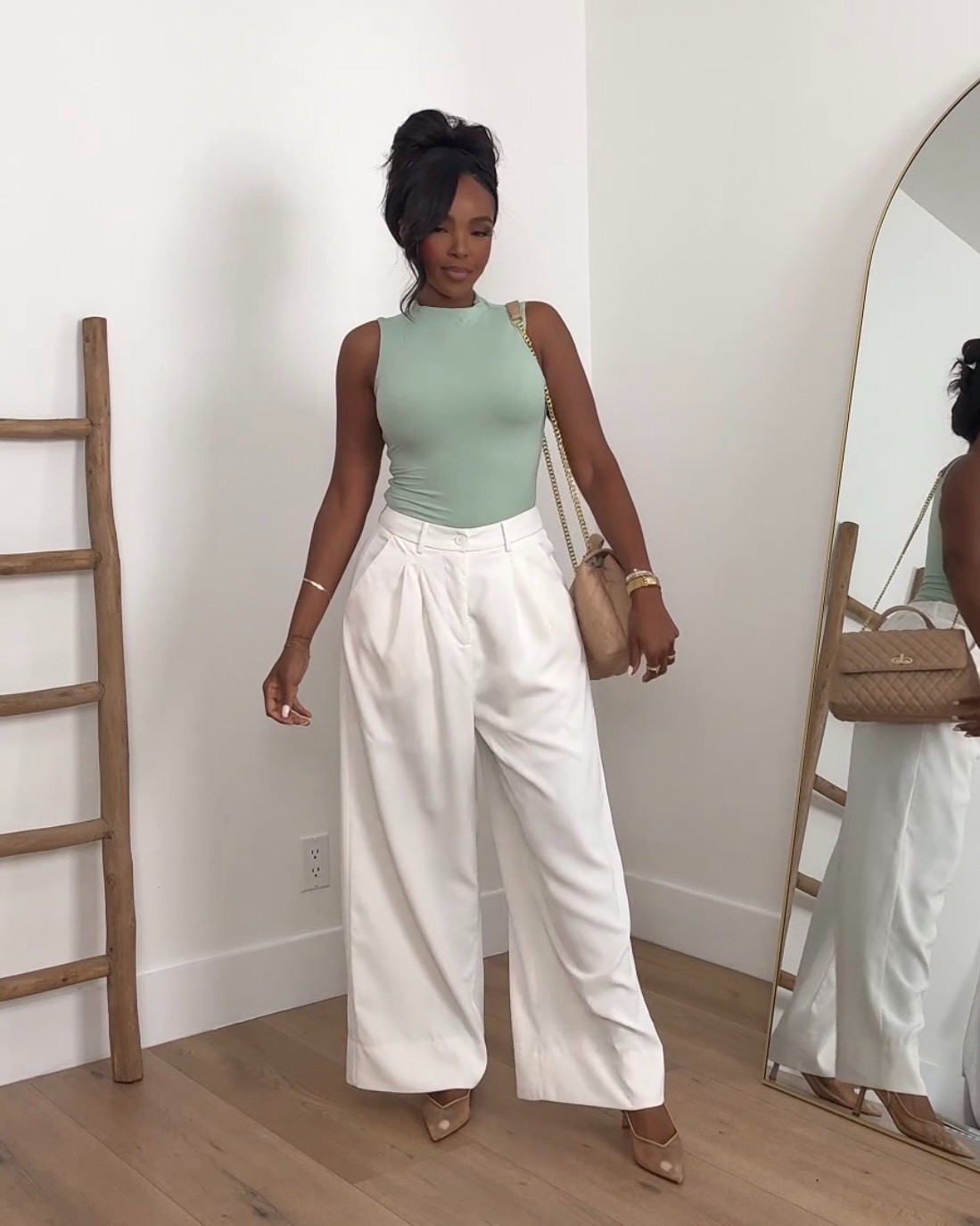 Scroll to shop this soft spring outfit featuring a sage green fitted tank styled with high-waisted white wide-leg trousers for a fresh, elevated neutral look. This color combo is trending for spring outfits 2026 and works beautifully for vacation outfits beach styling, while the classic trousers can be styled multiple ways so the cost per wear keeps dropping over time.

Perfect for brunch dates, vacation outfits beach dinners, casual work outfits, or everyday date night outfits.

5'4" | 138 lbs | 34D bust | 27" waist | 40" hips

#LTKvlog #LTKootd #LTKgrwm